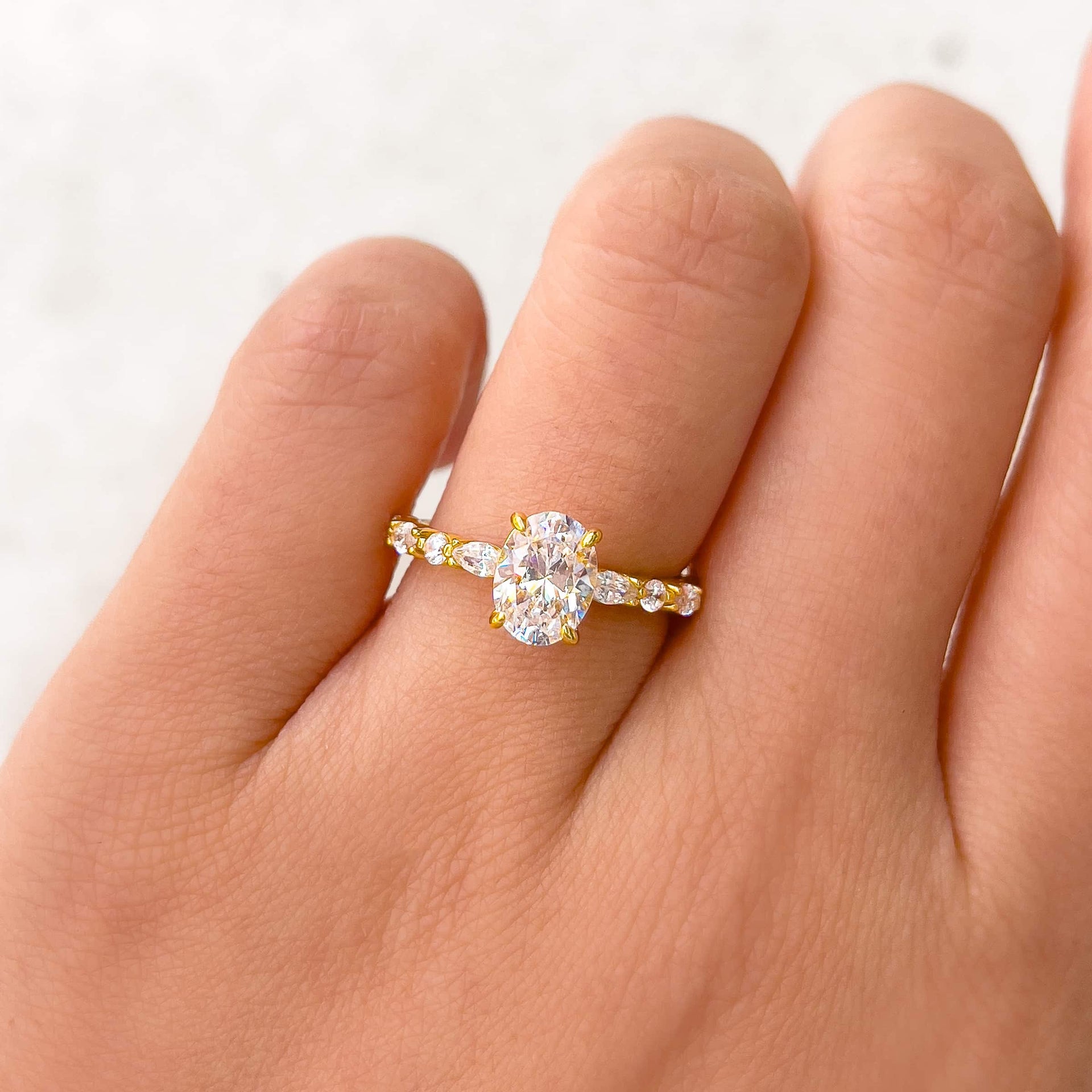 gold oval cut vintage style engagement ring