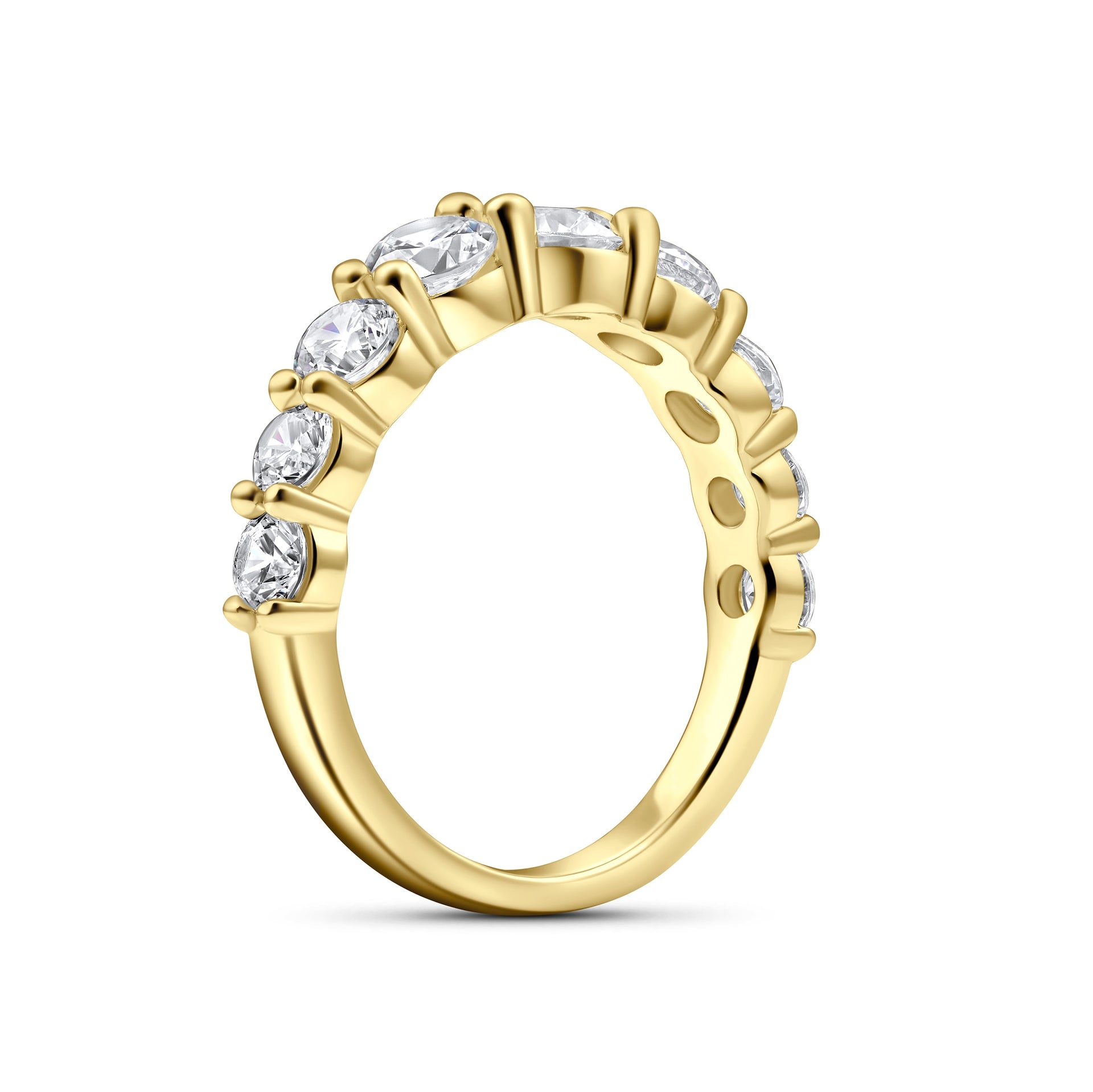 semi side view of a gold unique half eternity wedding band on a white background
