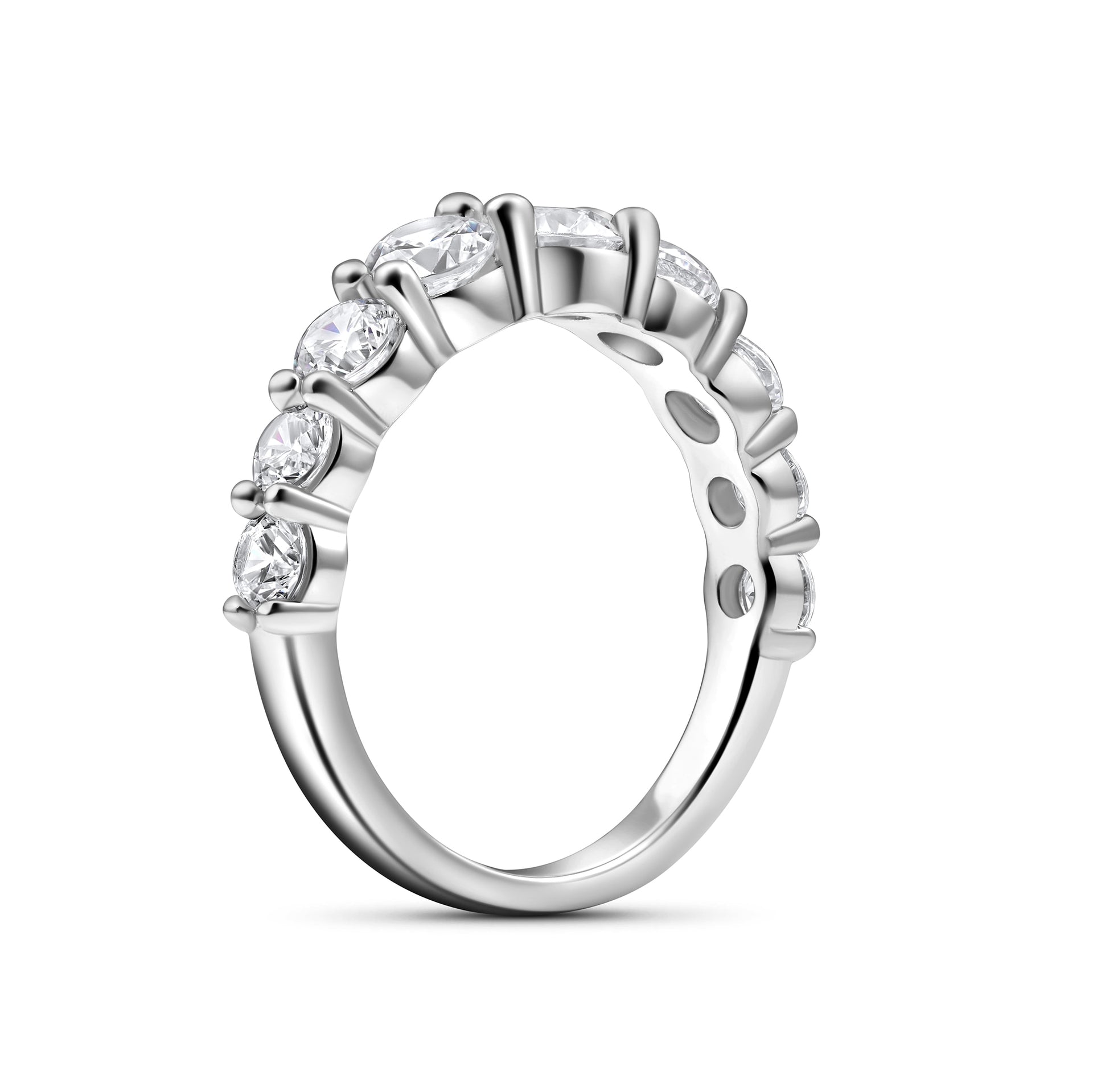 semi side view of a silver unique half eternity wedding band on a white background
