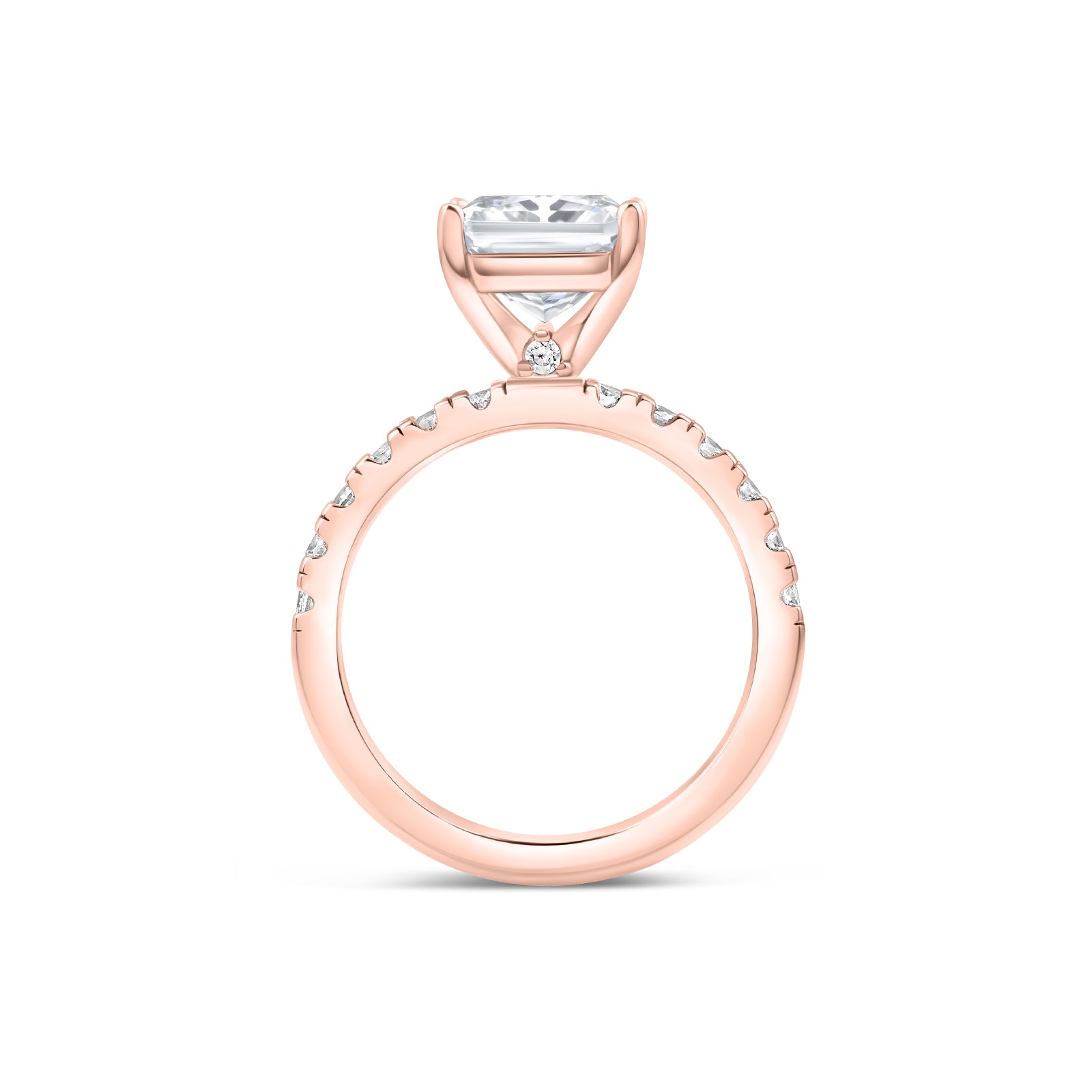 Band view of sleek rose gold radiant cut engagement ring with dainty stone detailing under its setting and a half eternity band