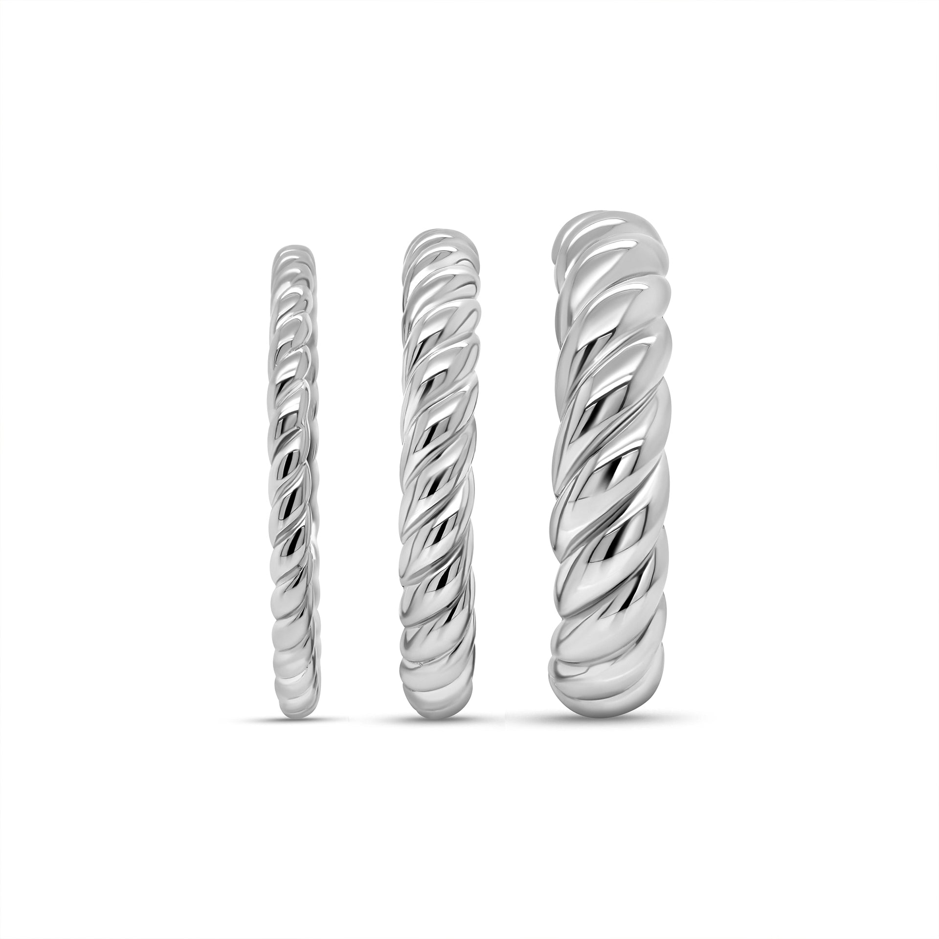side view of silver 3 piece ring set with unique twisting detailing