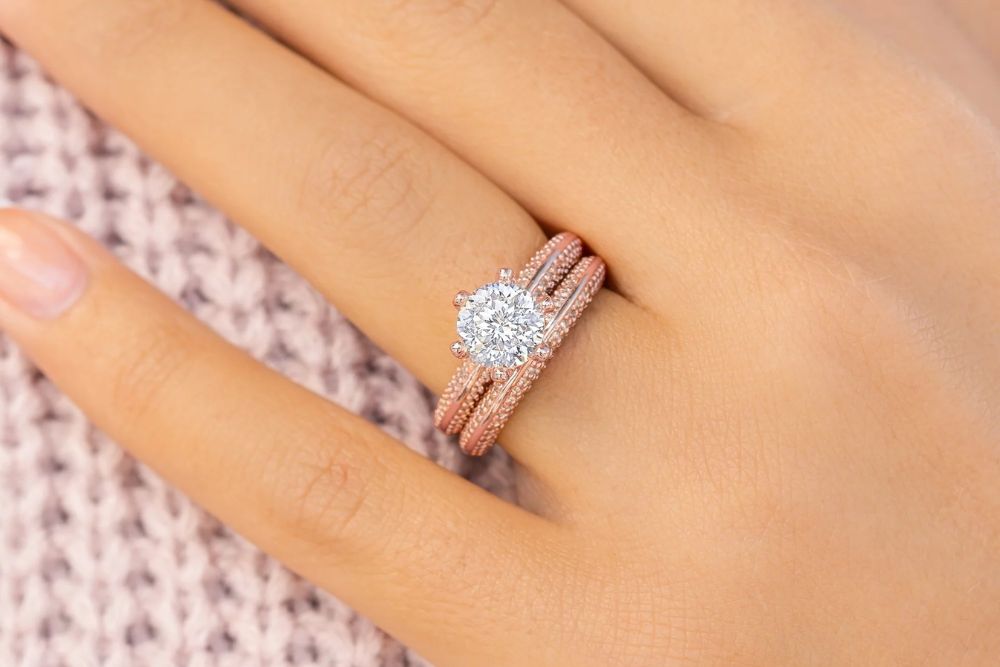 up close shot of rose gold bridal set