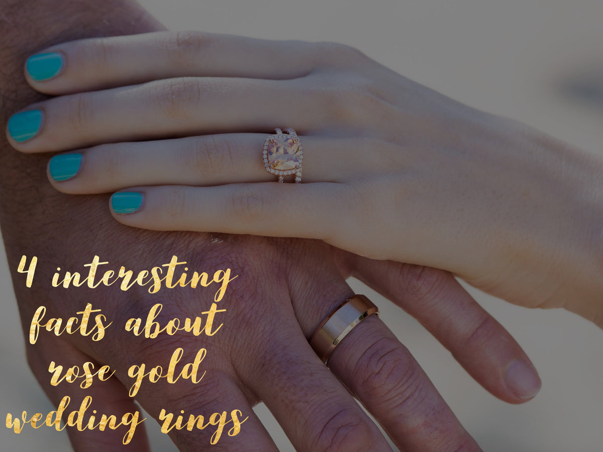 Hand wearing stacked diamond rings.
