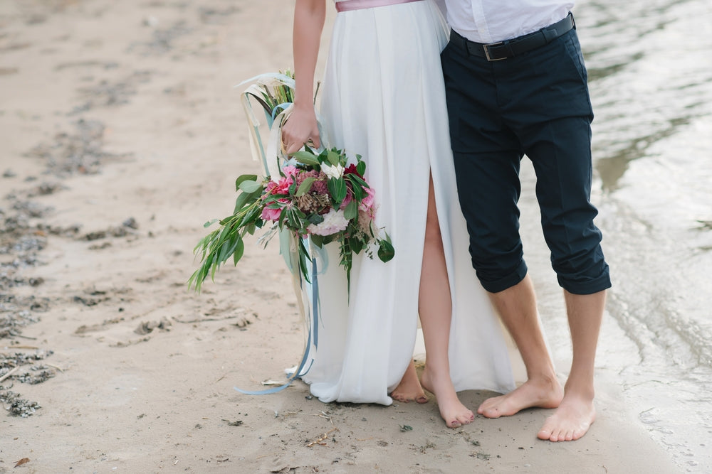 Bride and groom on the beach