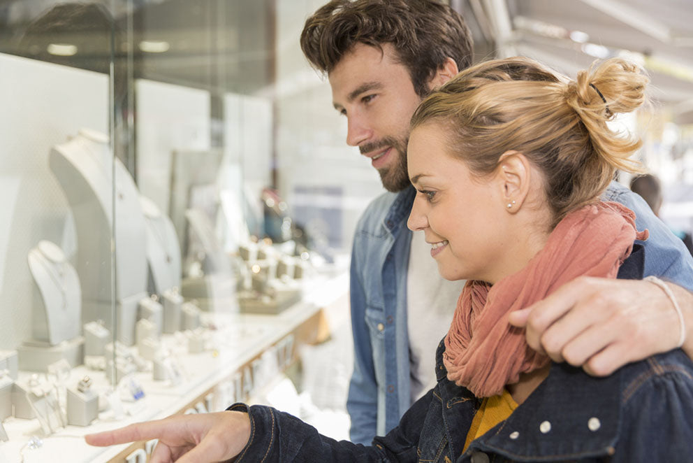 couple jewelry window shopping