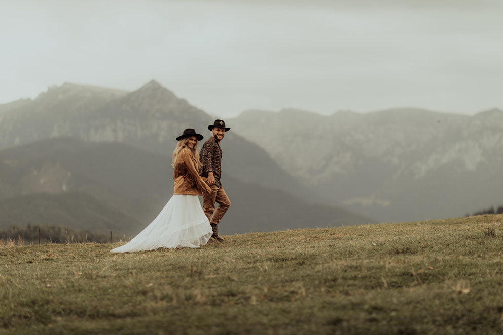 couple walks holding hands