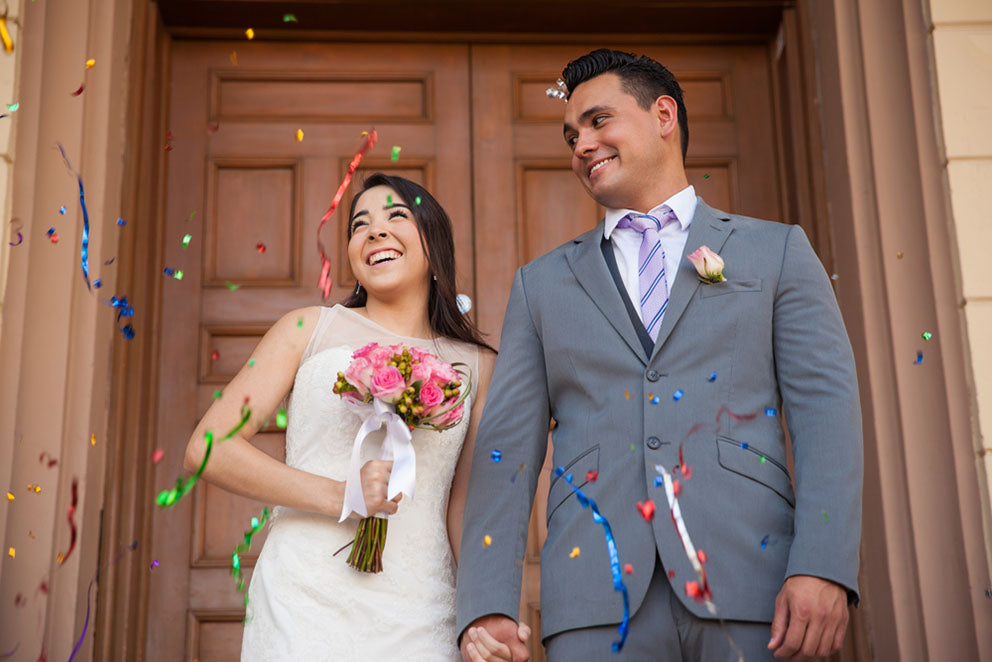 happy bride and groom outside church