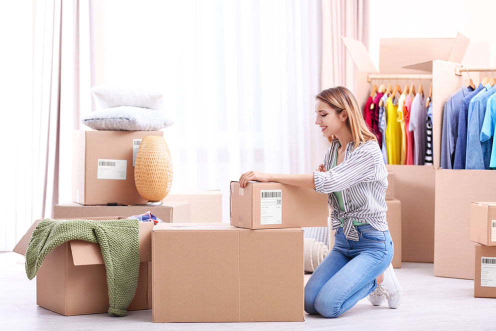 packing wardrobe into boxes