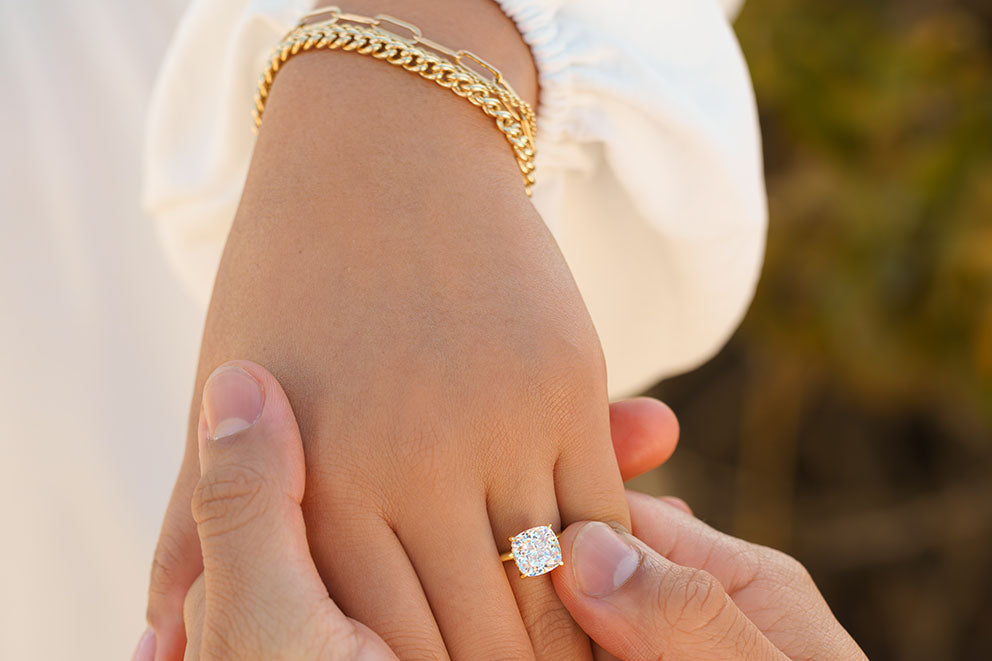 placing ring on hand