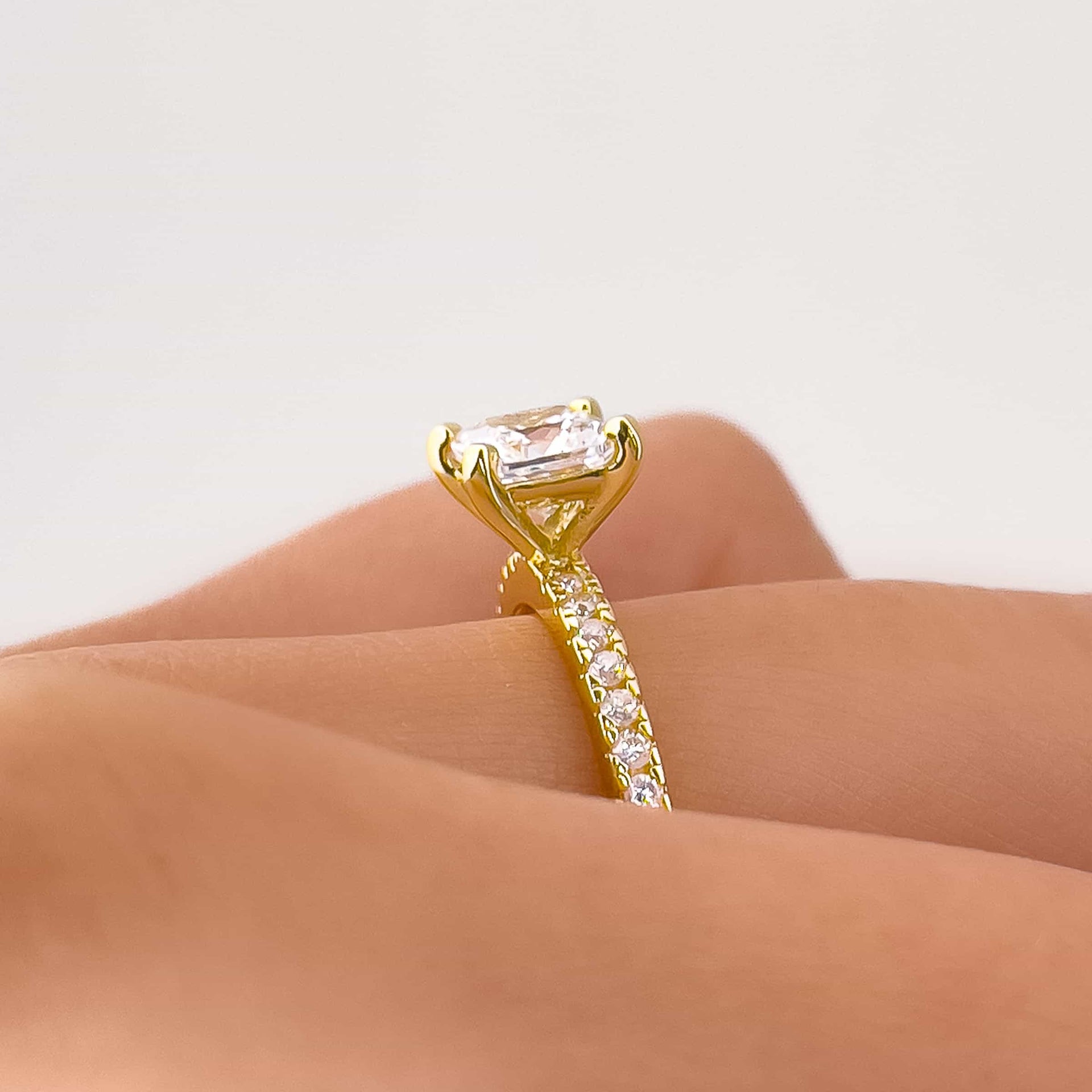 setting shot of gold princess cut half eternity engagement ring