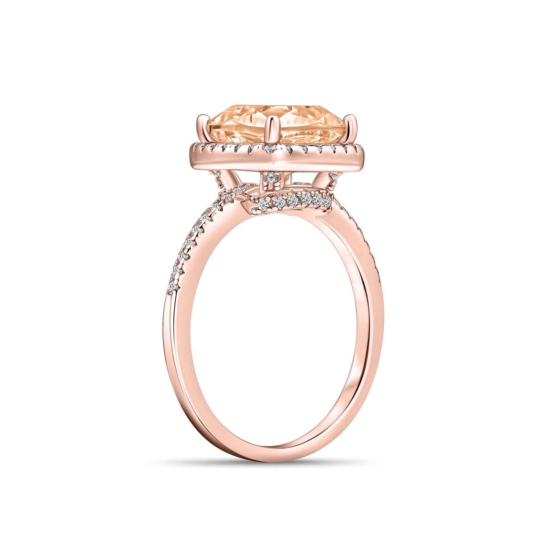 side angle of rose gold engagement ring on white background