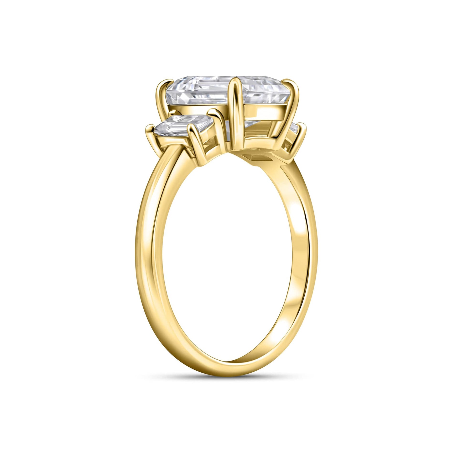 gold 1.5 carat emerald cut trinity style engagement ring