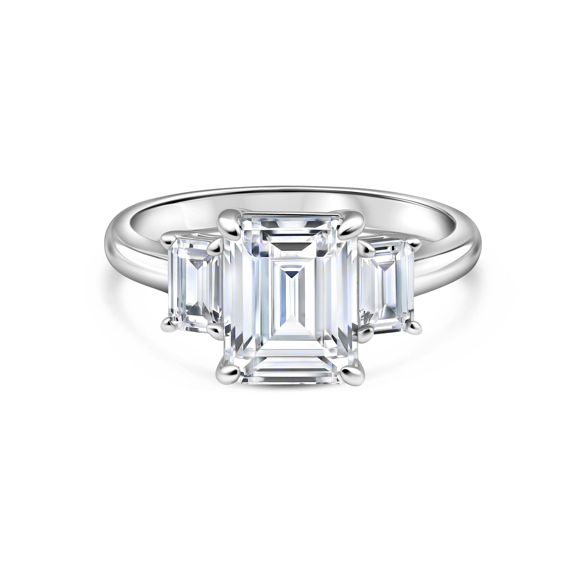 stunning silver emerald cut trio engagement ring on white backgroun