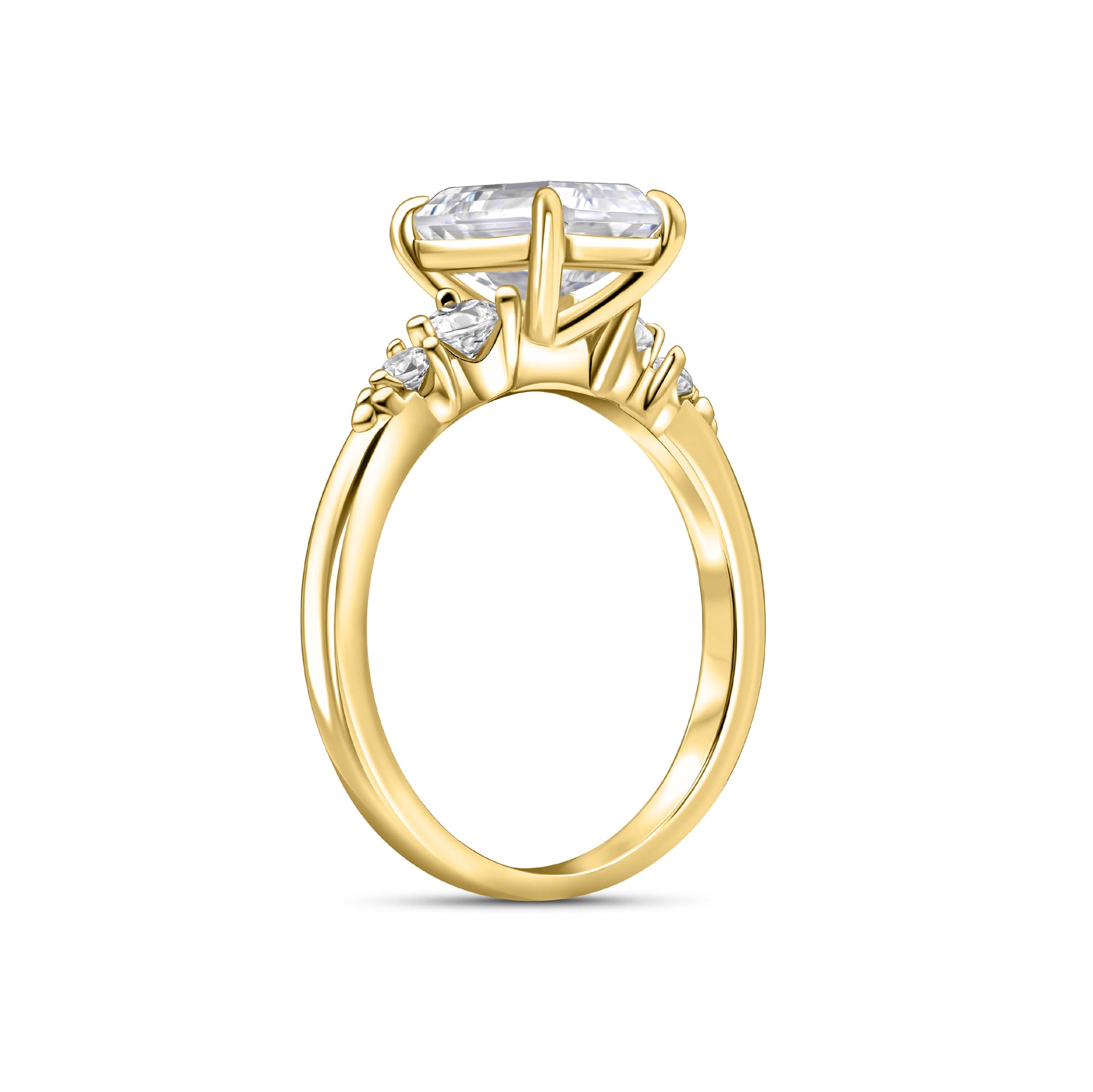 Gold 1.5 emerald cut engagement ring with two round side stones on either side