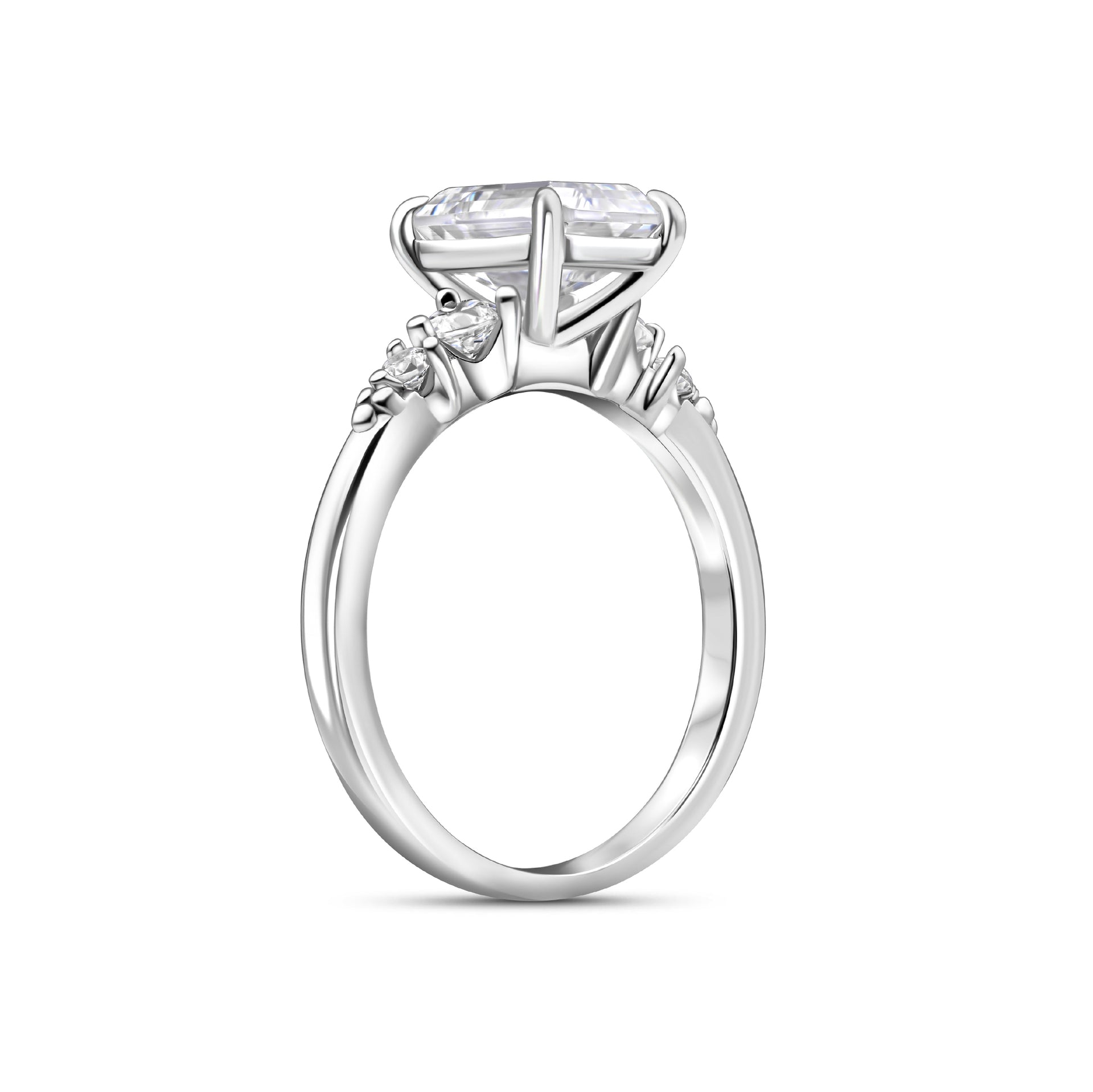 silver 1.5 emerald cut engagement ring with two round side stones on either side