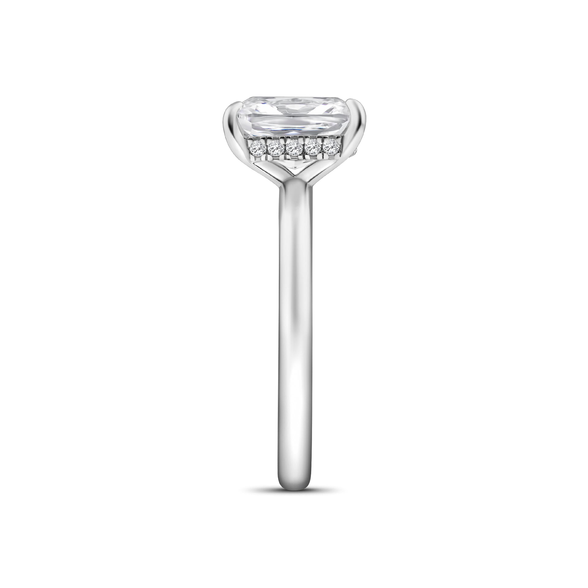 side view of silver 4 carat elongated cushion cut solitaire engagement ring with a hidden halo on a white background
