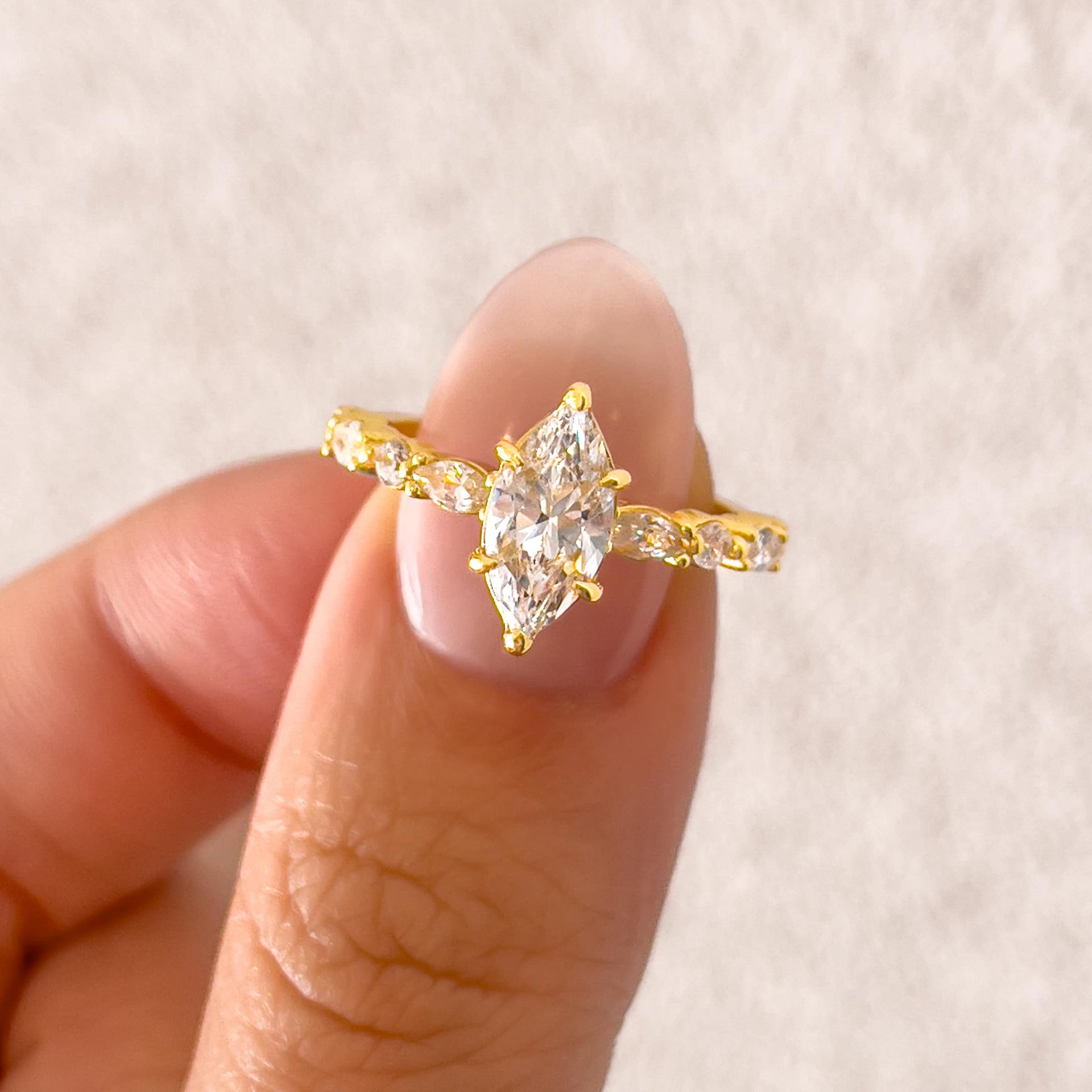 stunning 1 carat marquise cut half eternity vintage engagement ring on female model