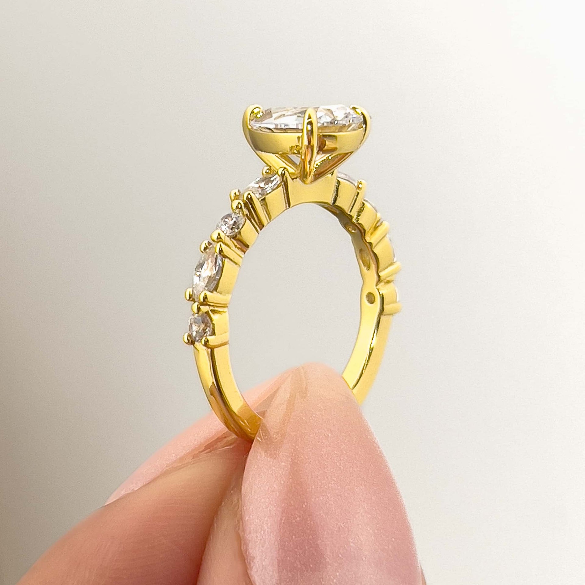 setting shot of gold vintage pear cut engagement ring