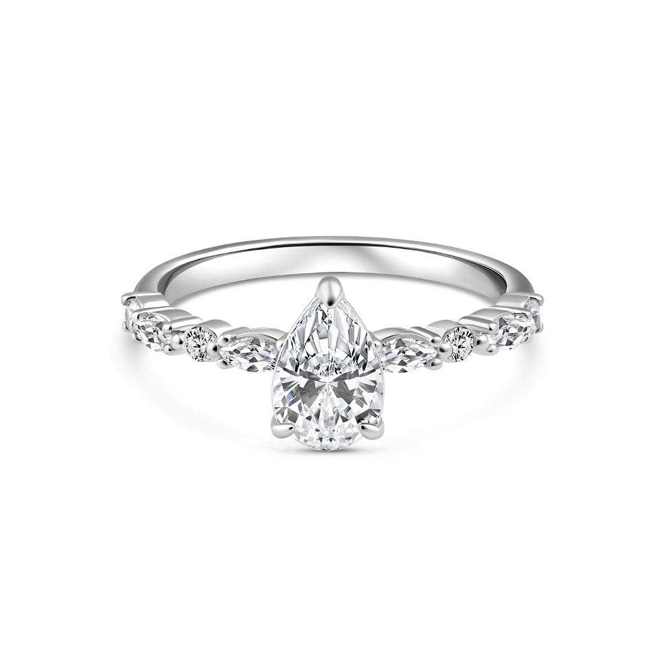 silver 1.5 carat pear cut vintage engagement ring on white background