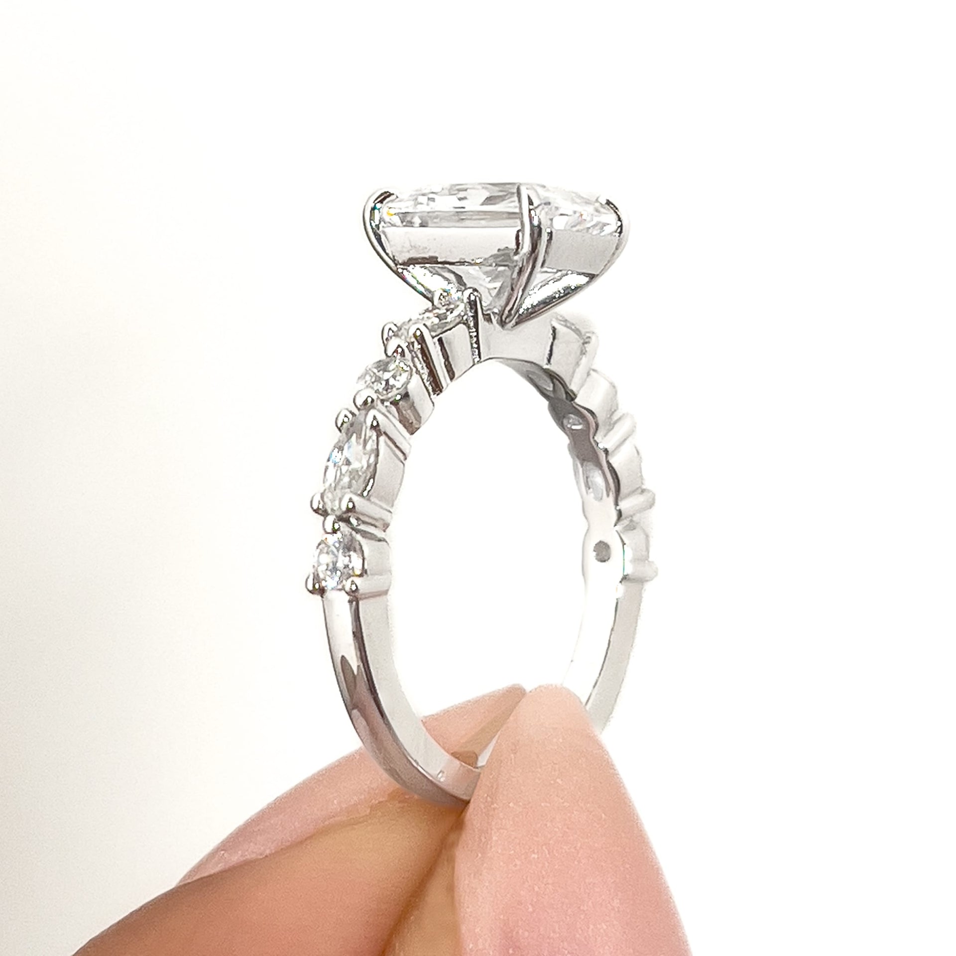 setting shot of silver vintage radiant cut engagement ring