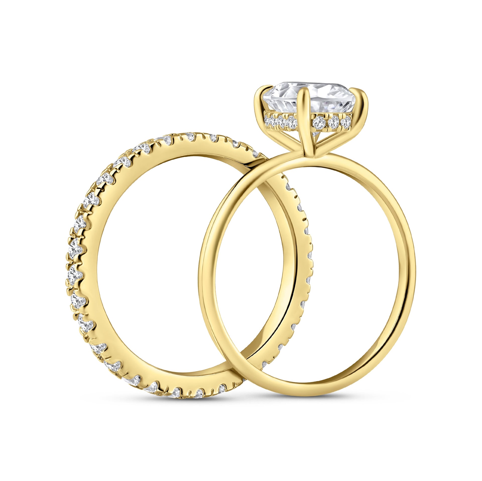 side view of classic gold 3 carat oval cut wedding ring set with solitaire engagement ring and full eternity wedding band on a white background
