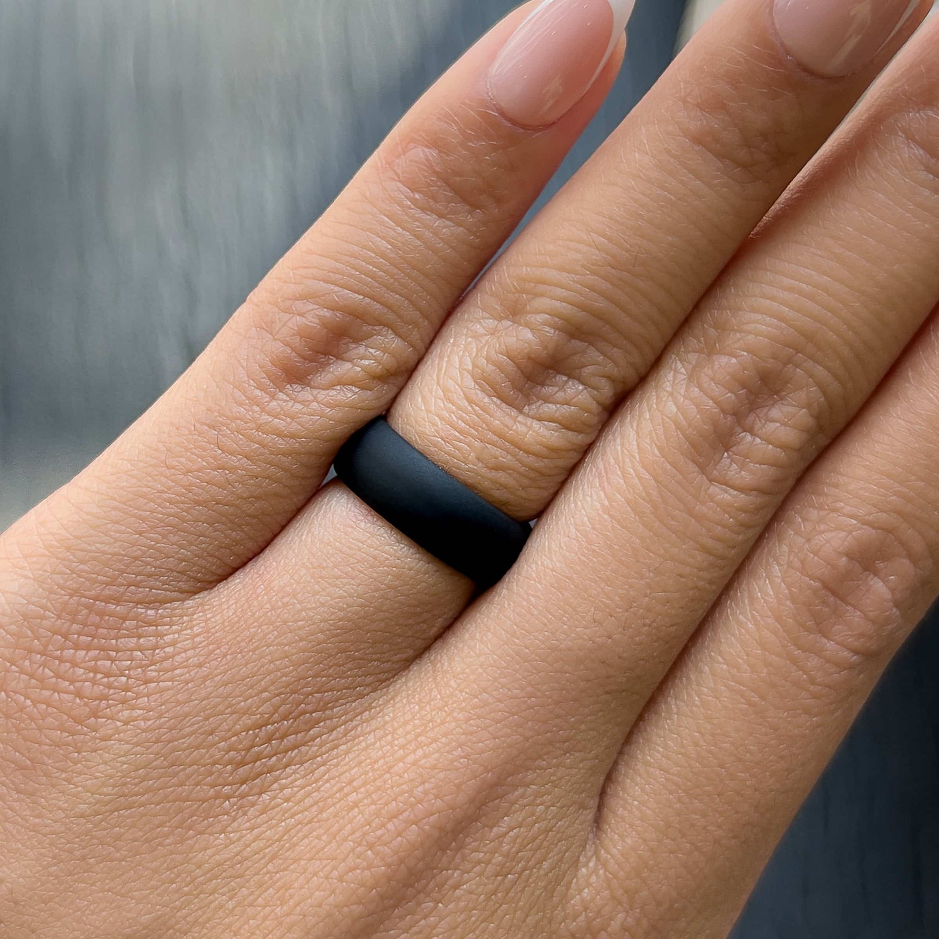 black silicone alternative band worn by model 