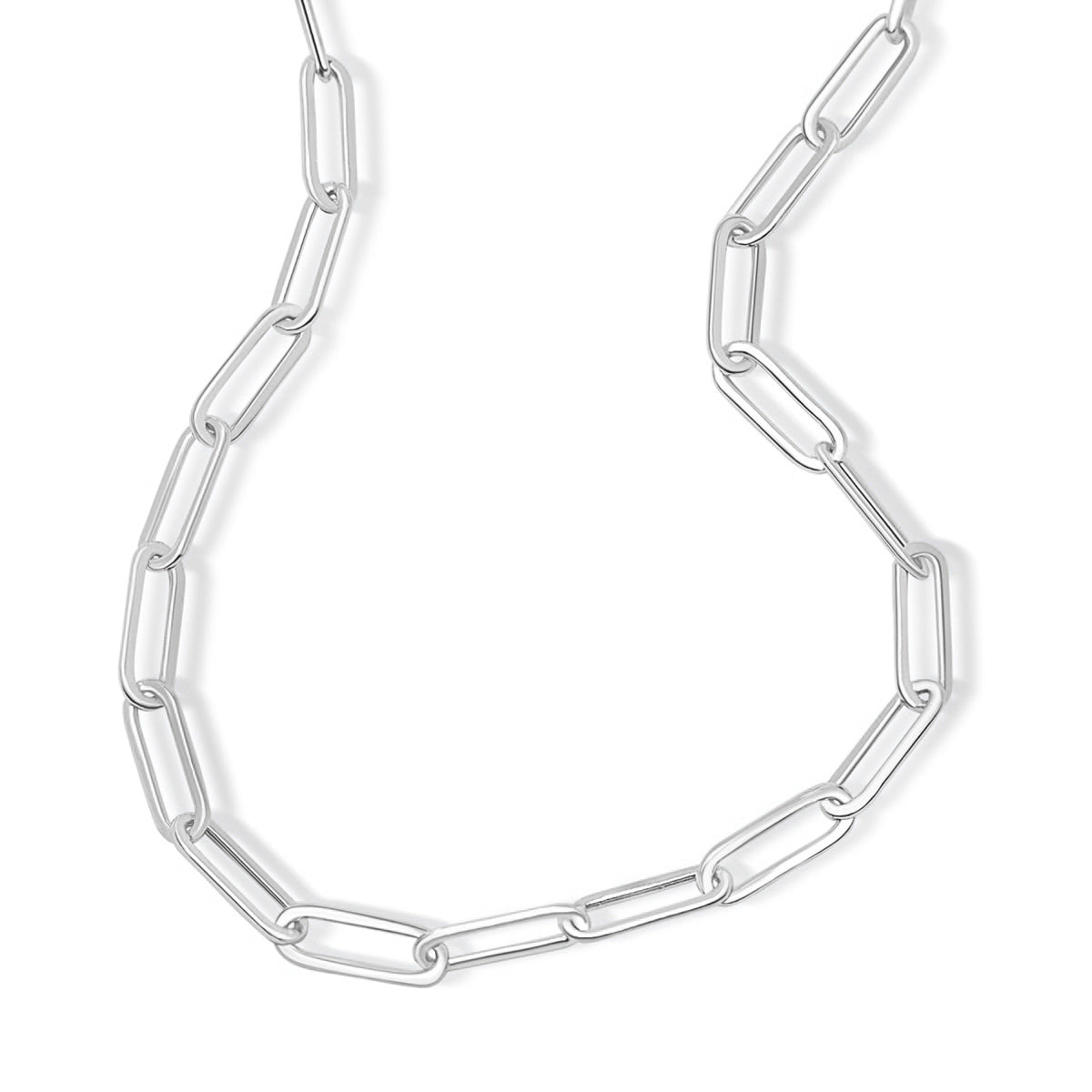 close up of simple silver paperclip style chain necklace on white background