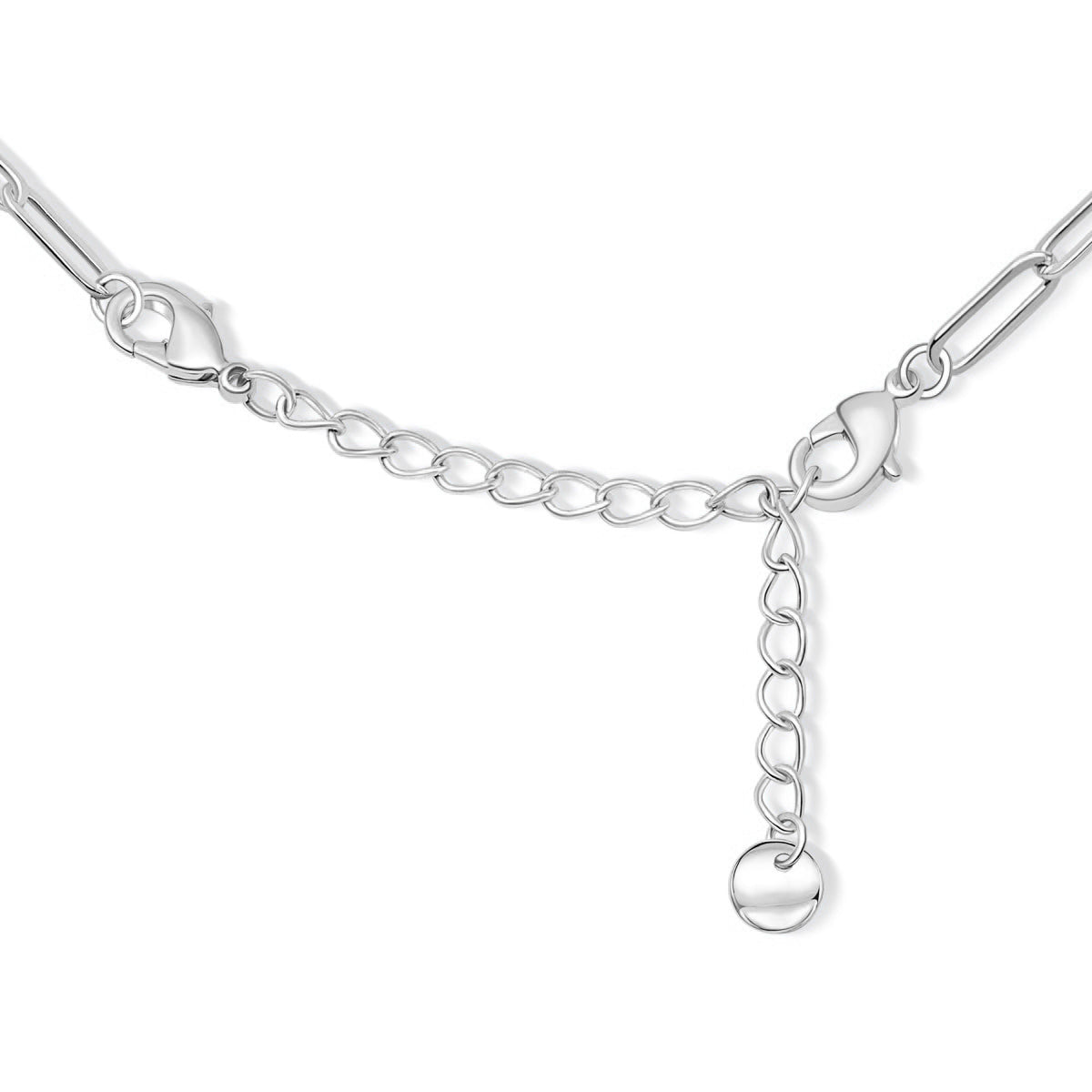 close up of the chain extender portion of a silver paperclip style chain necklace on white background