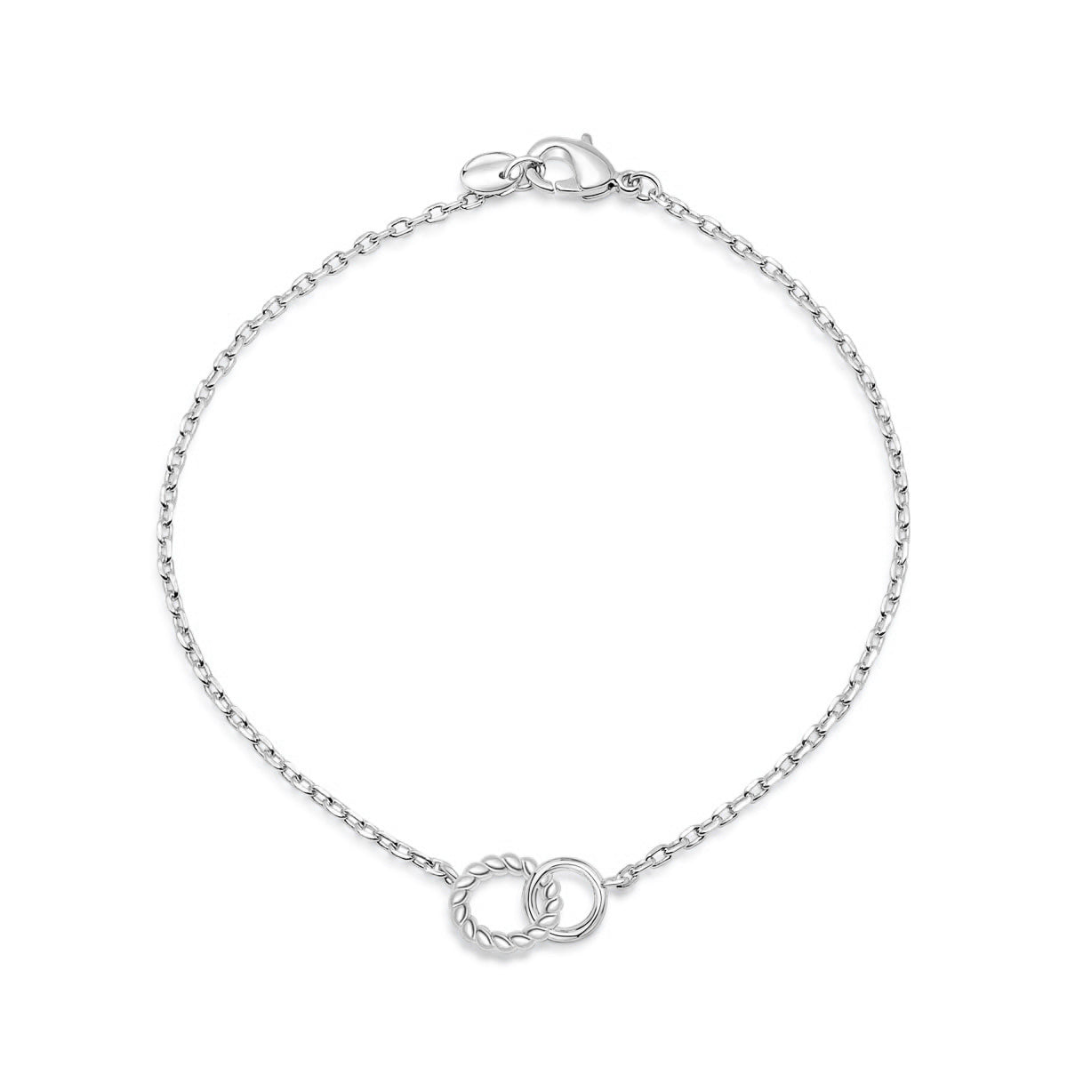 silver dainty bracelet with minimal interlocking hoop detail on a white background