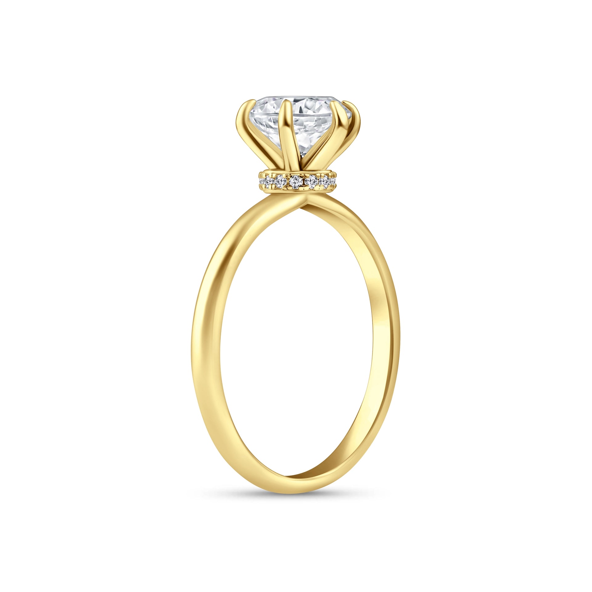 Side view of gold 2 carat round cut engagement ring with secret halo detail on a white background