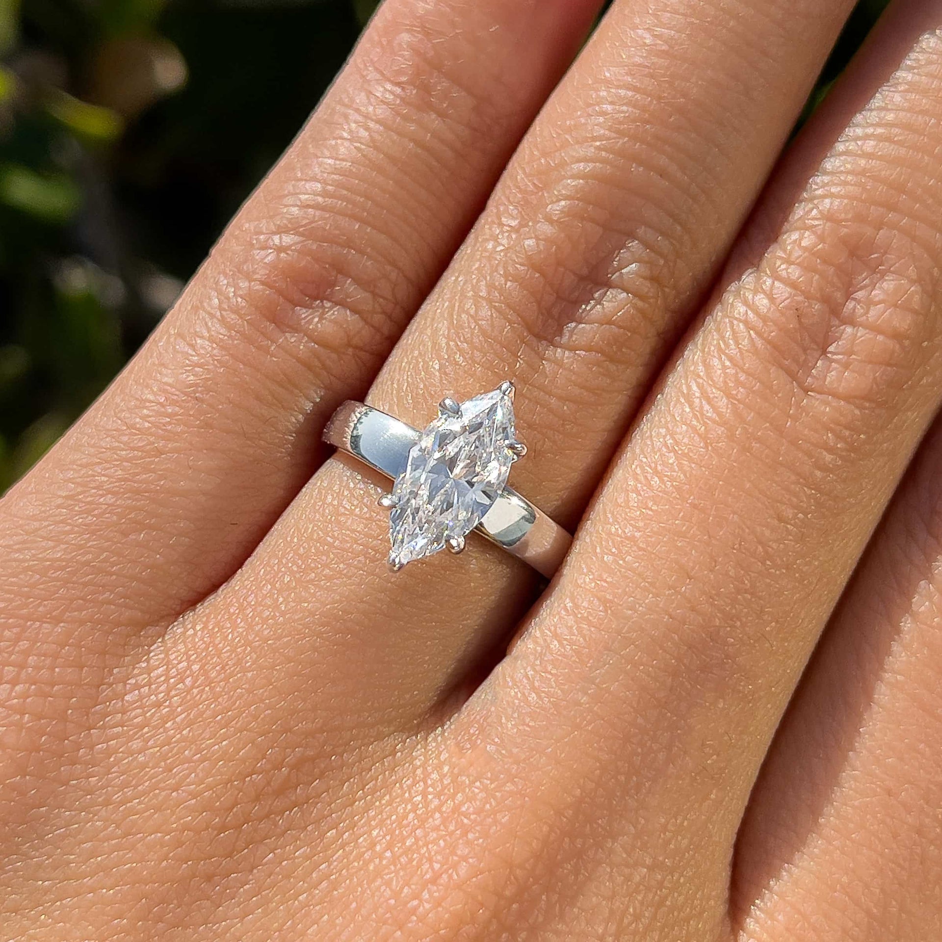 stunning 2 carat marquise cut solitaire ring with a thicker 3mm band on model 
