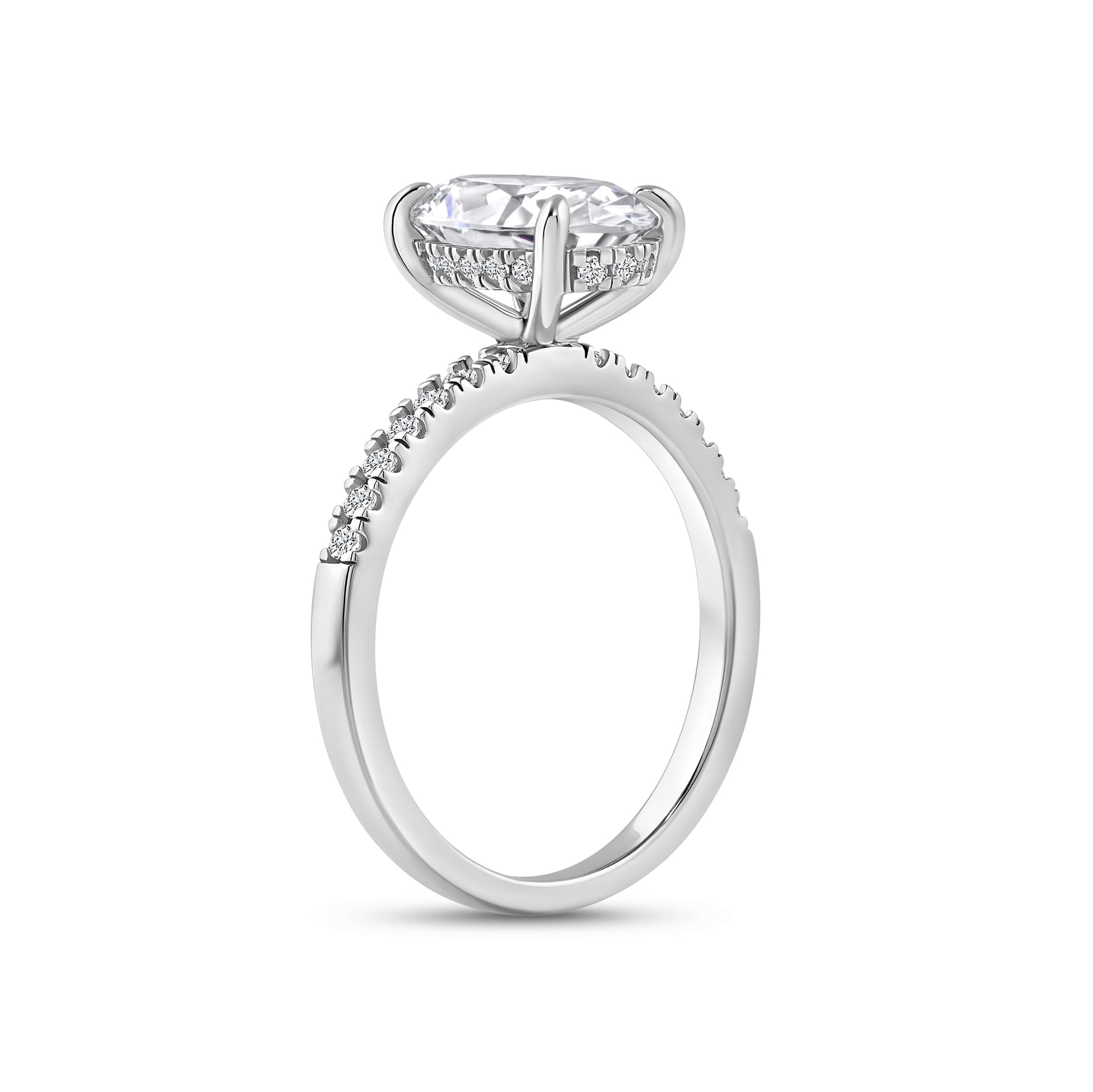 silver 4 carat oval cut half eternity engagement ring with a hidden halo shown from an alternate angle on white background