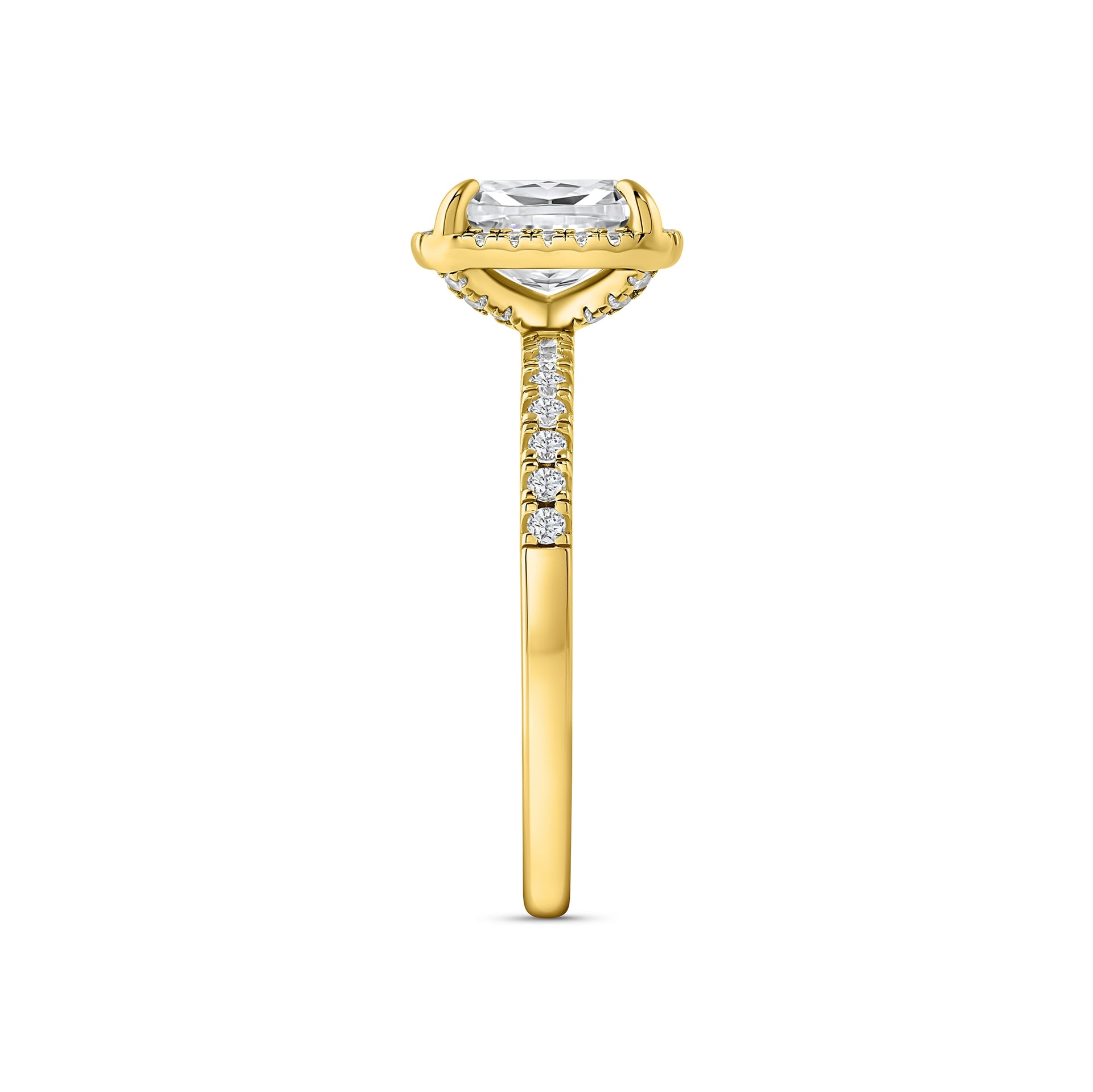 side view of gold 3 carat elongated cushion cut halo engagement ring on white background