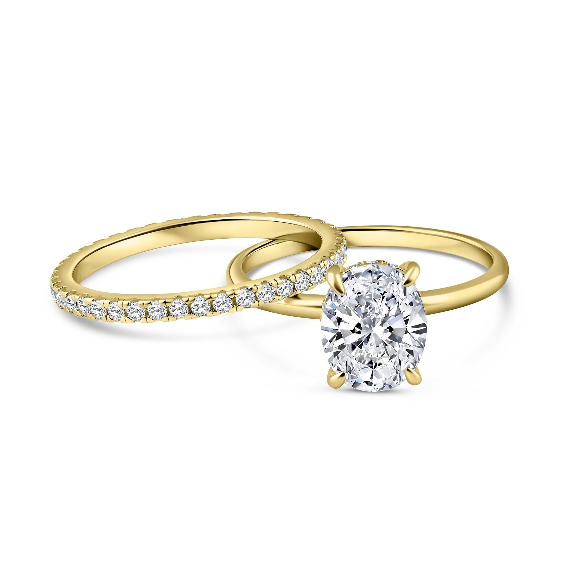 classic gold 3 carat oval cut hidden halo solitaire wedding ring set on white background