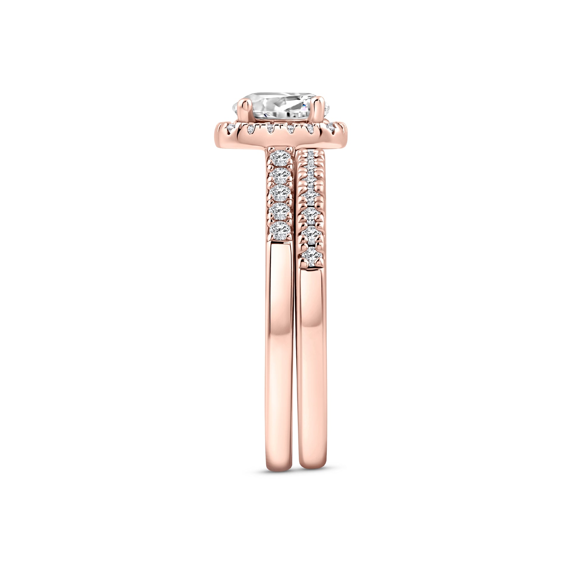 rose gold 1.5 carat round cut cushion halo wedding ring set on a white background