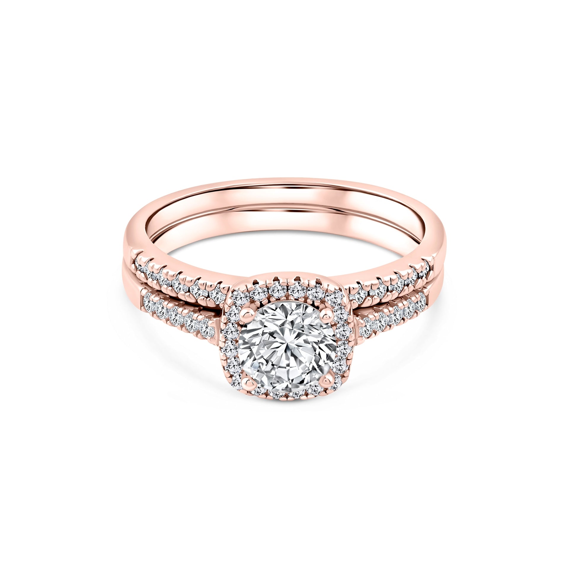 rose gold 1.5 carat round cut cushion halo wedding ring set on a white background