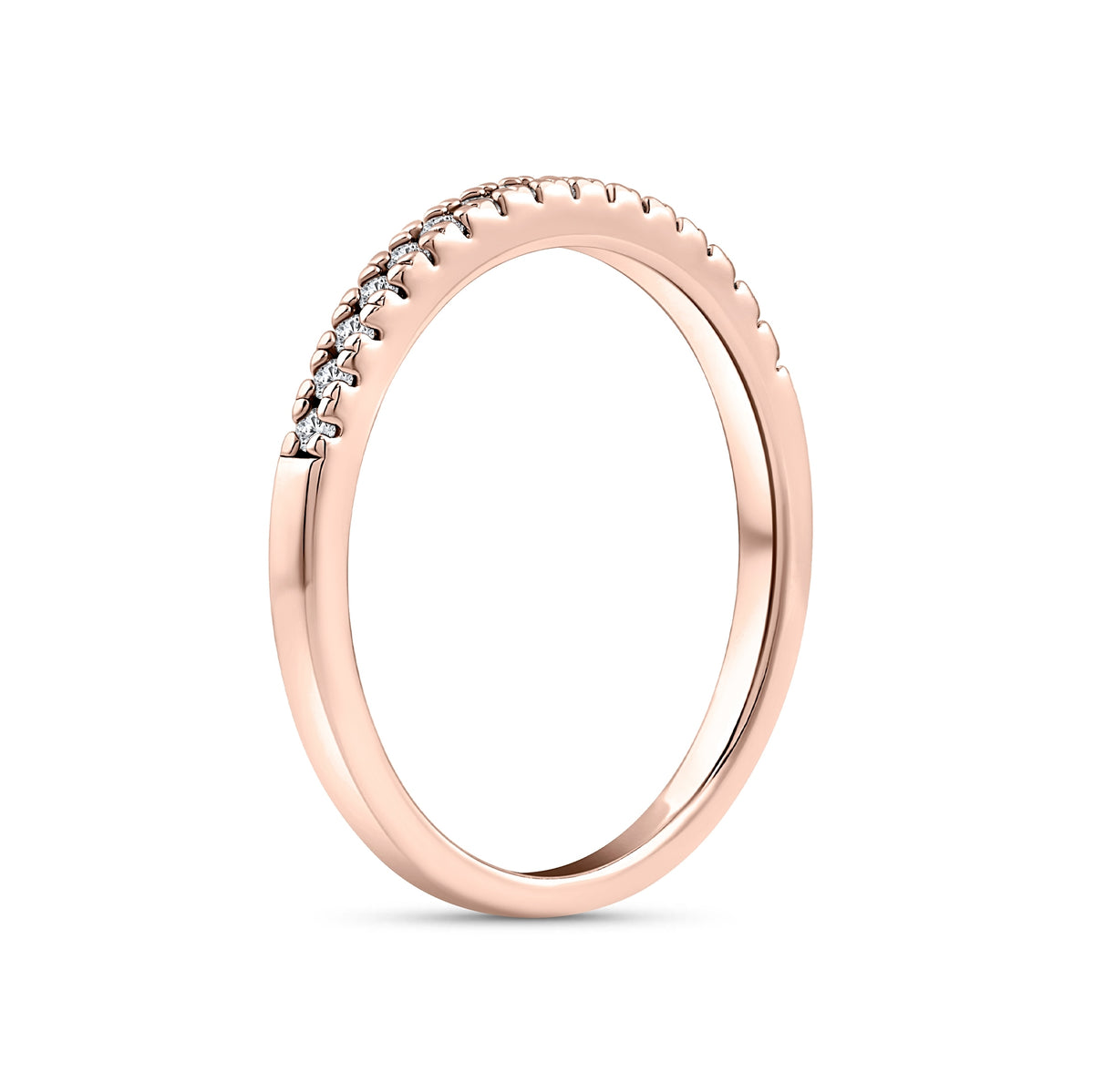 rose gold half eternity wedding band on a white background