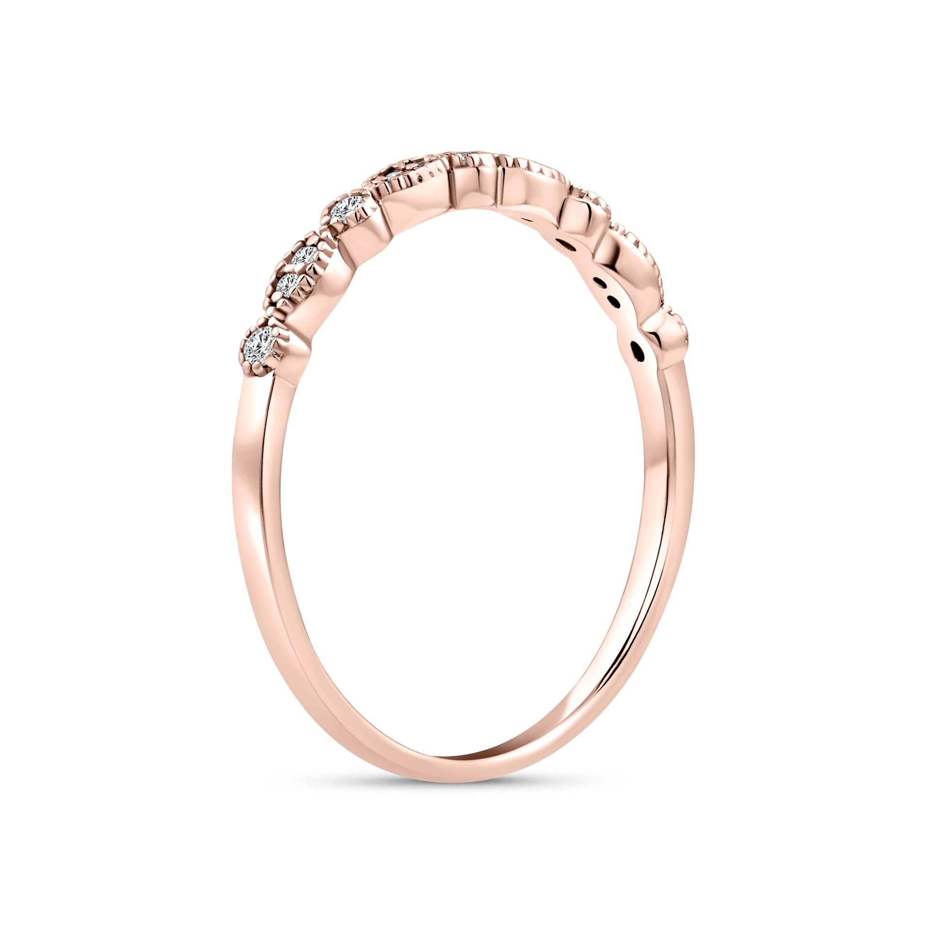 rose gold vintage inspired half eternity wedding band on a white background