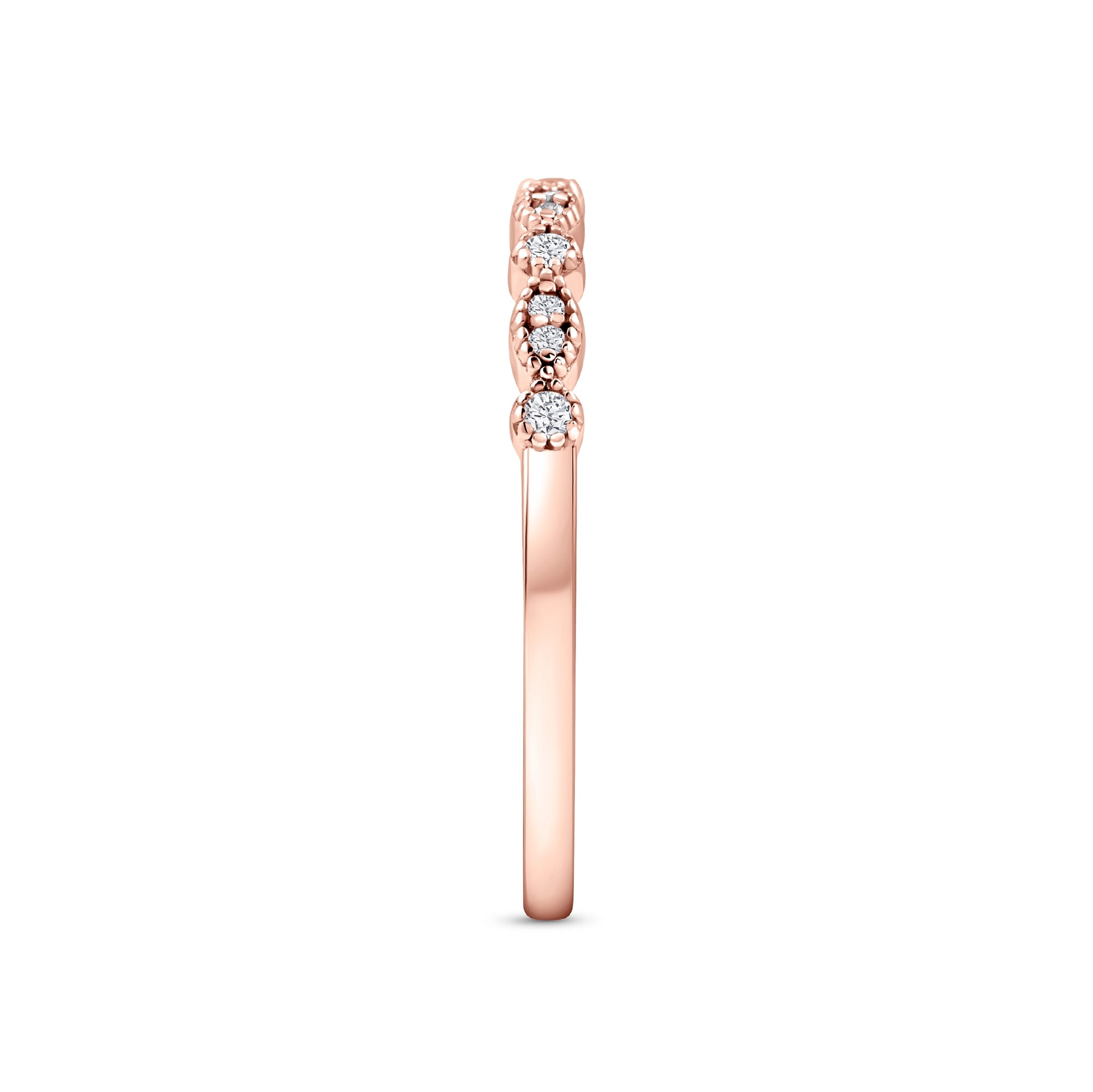 rose gold vintage inspired half eternity wedding band on a white background