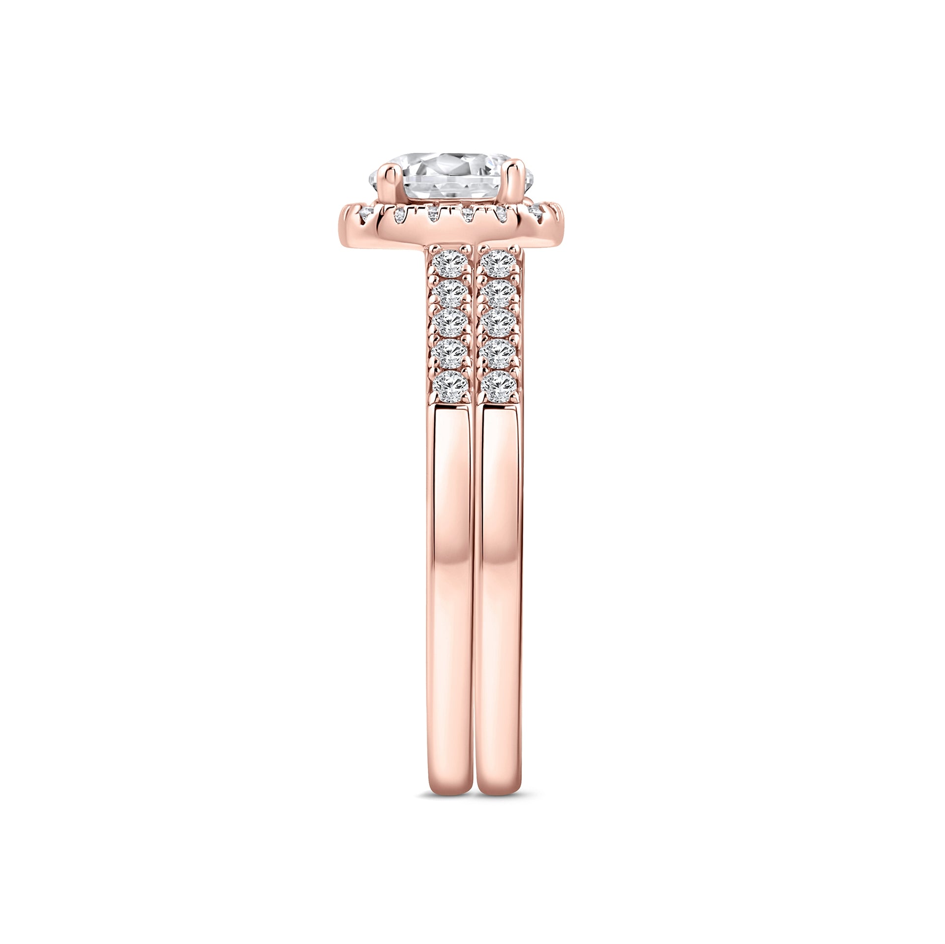 rose gold 1.5 carat round cut cushion halo wedding ring set on a white background