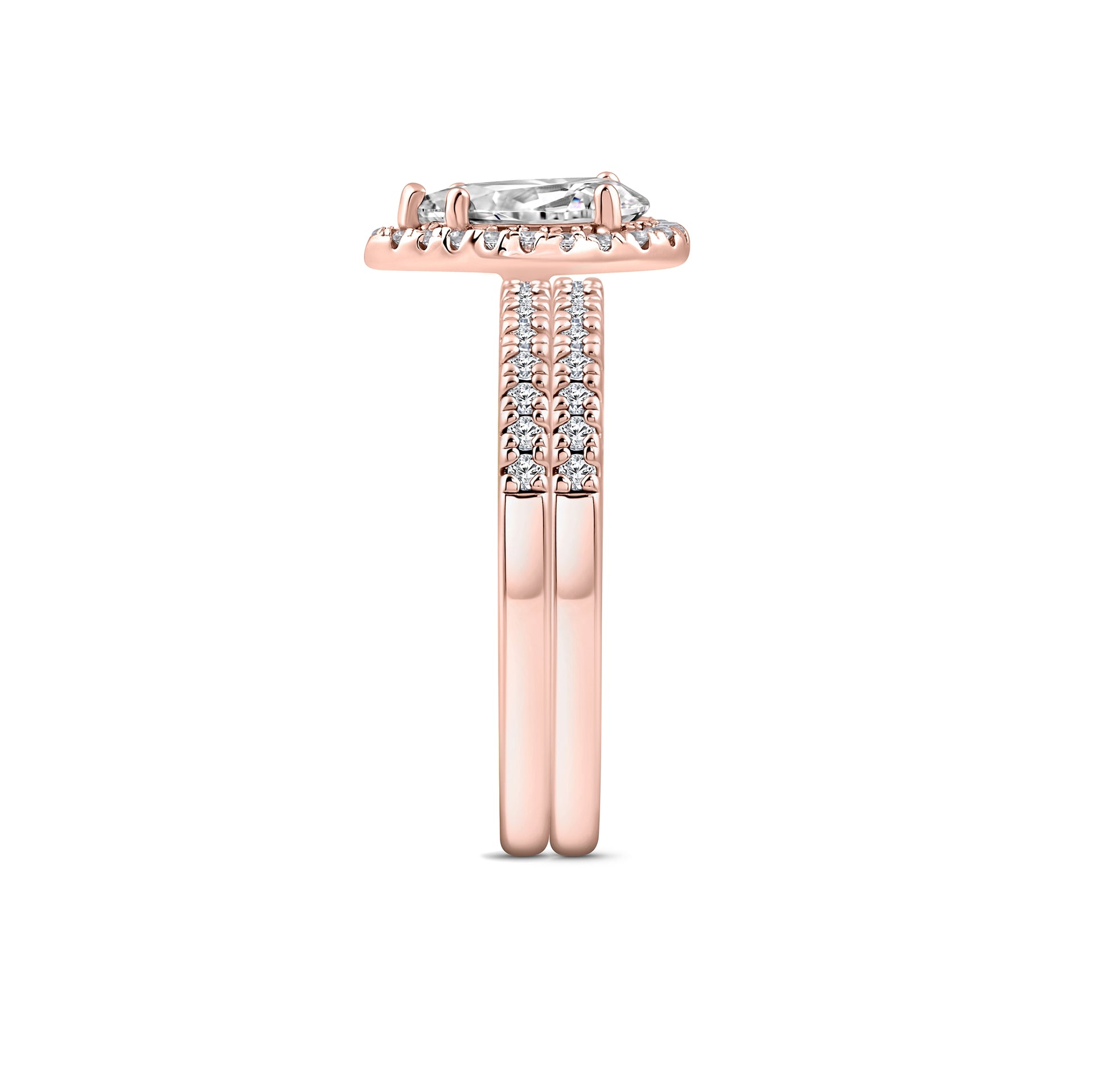 rose gold 2 carat pear cut halo wedding ring set on white background