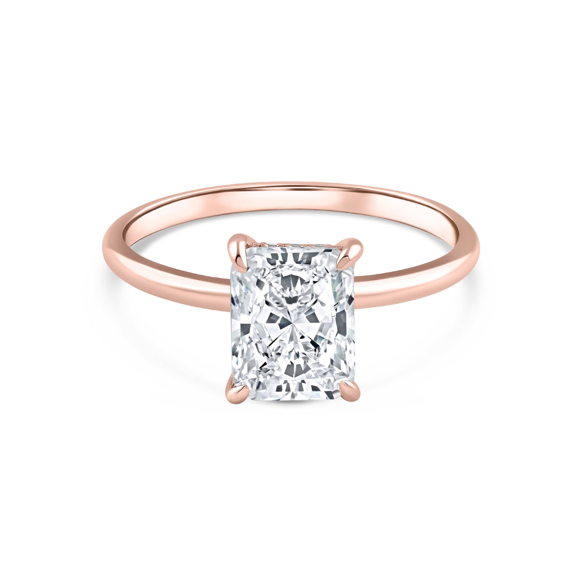 rose gold 3 carat radiant cut hidden halo solitaire engagement ring on a white background