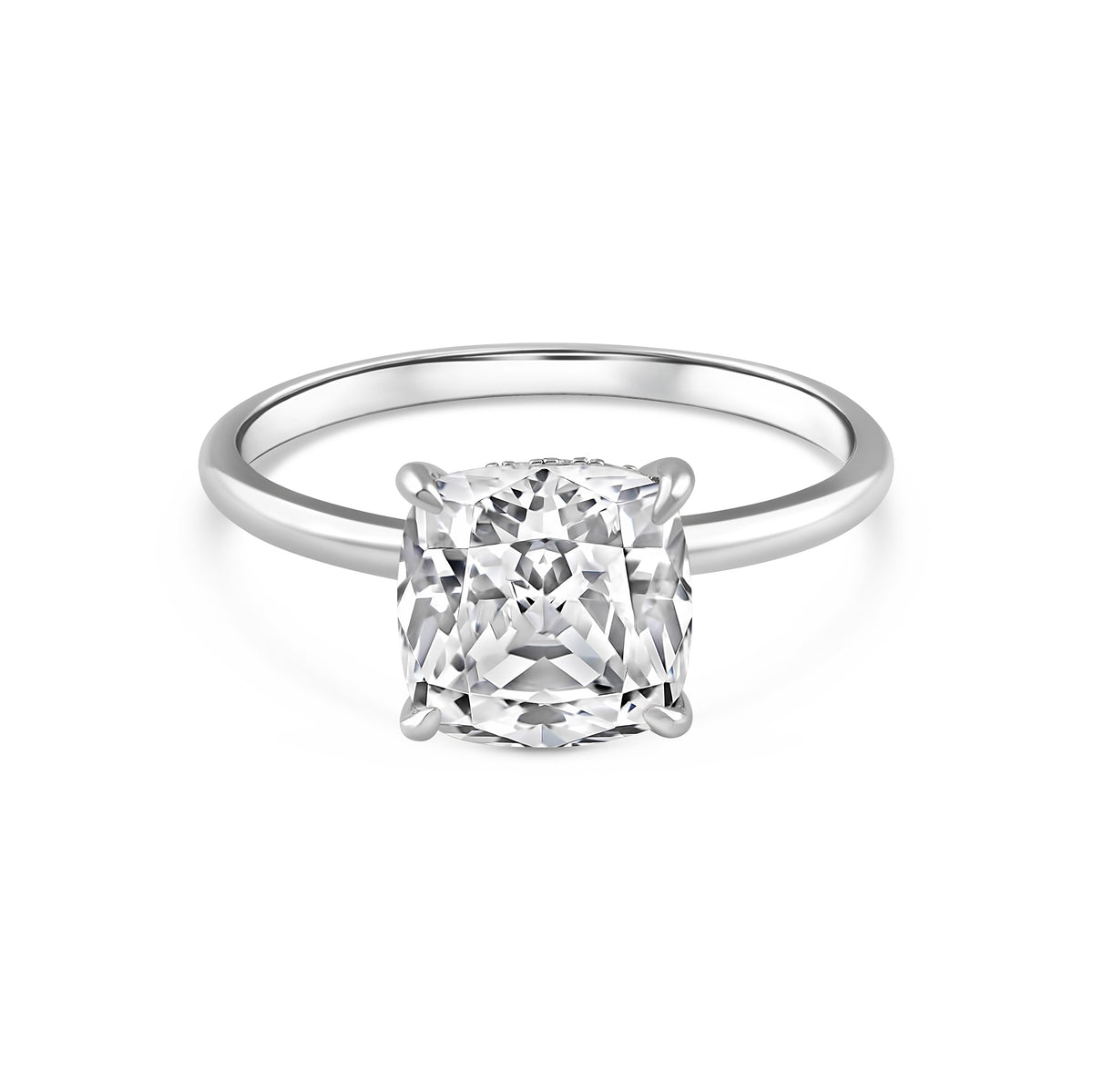 silver 3.5 carat cushion cut hidden halo solitaire engagement ring on a white background