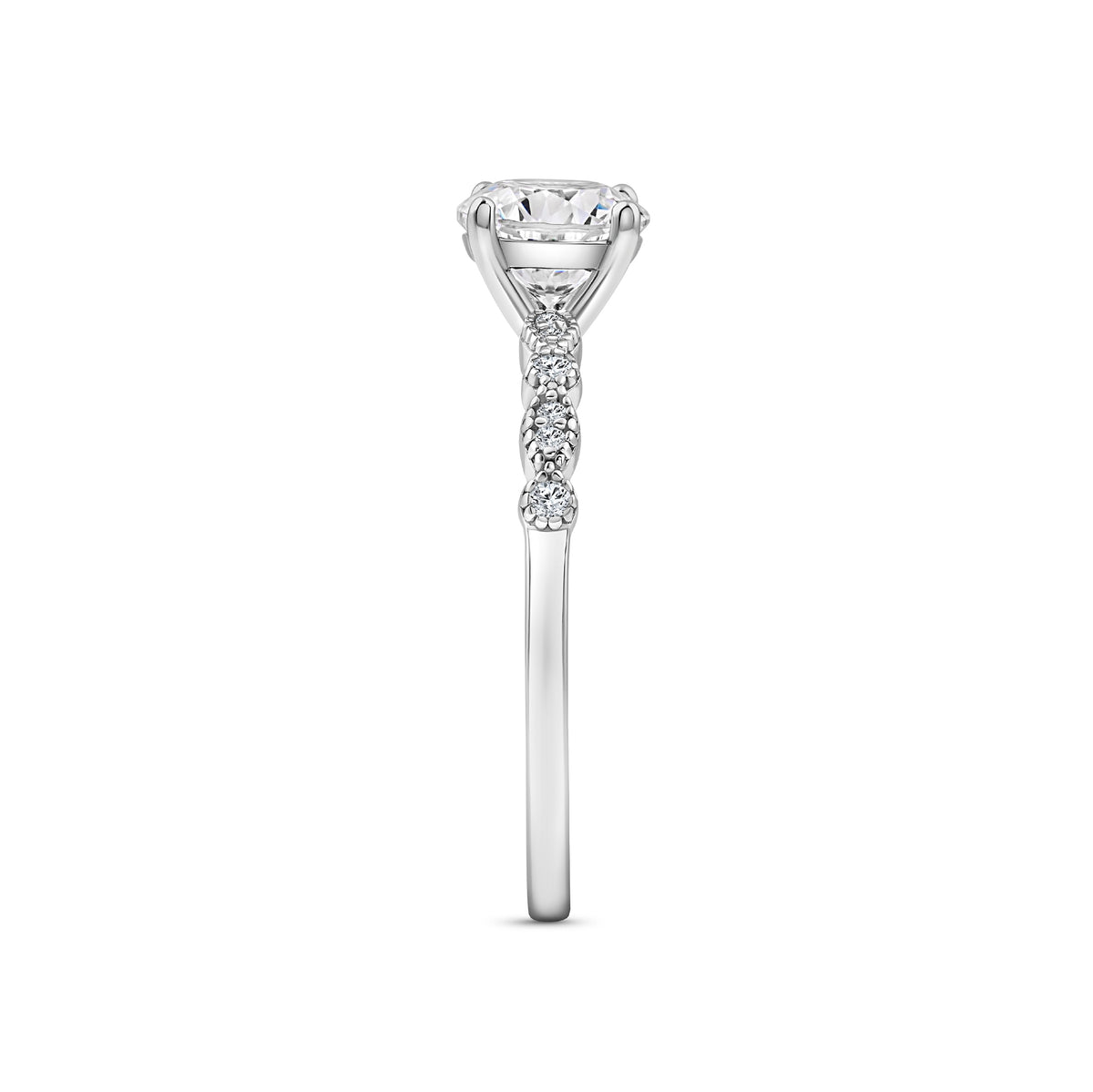 silver 1.5 carat round cut vintage inspired engagement ring on a white background
