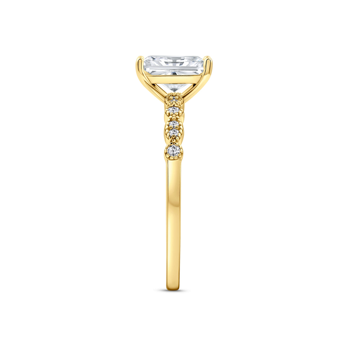 gold 1.5 carat radiant cut vintage-inspired engagement ring on a white background