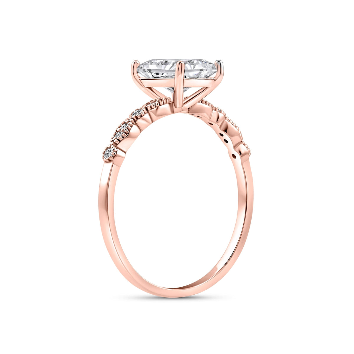 rose gold 1.5 carat radiant cut vintage-inspired engagement ring on a white background