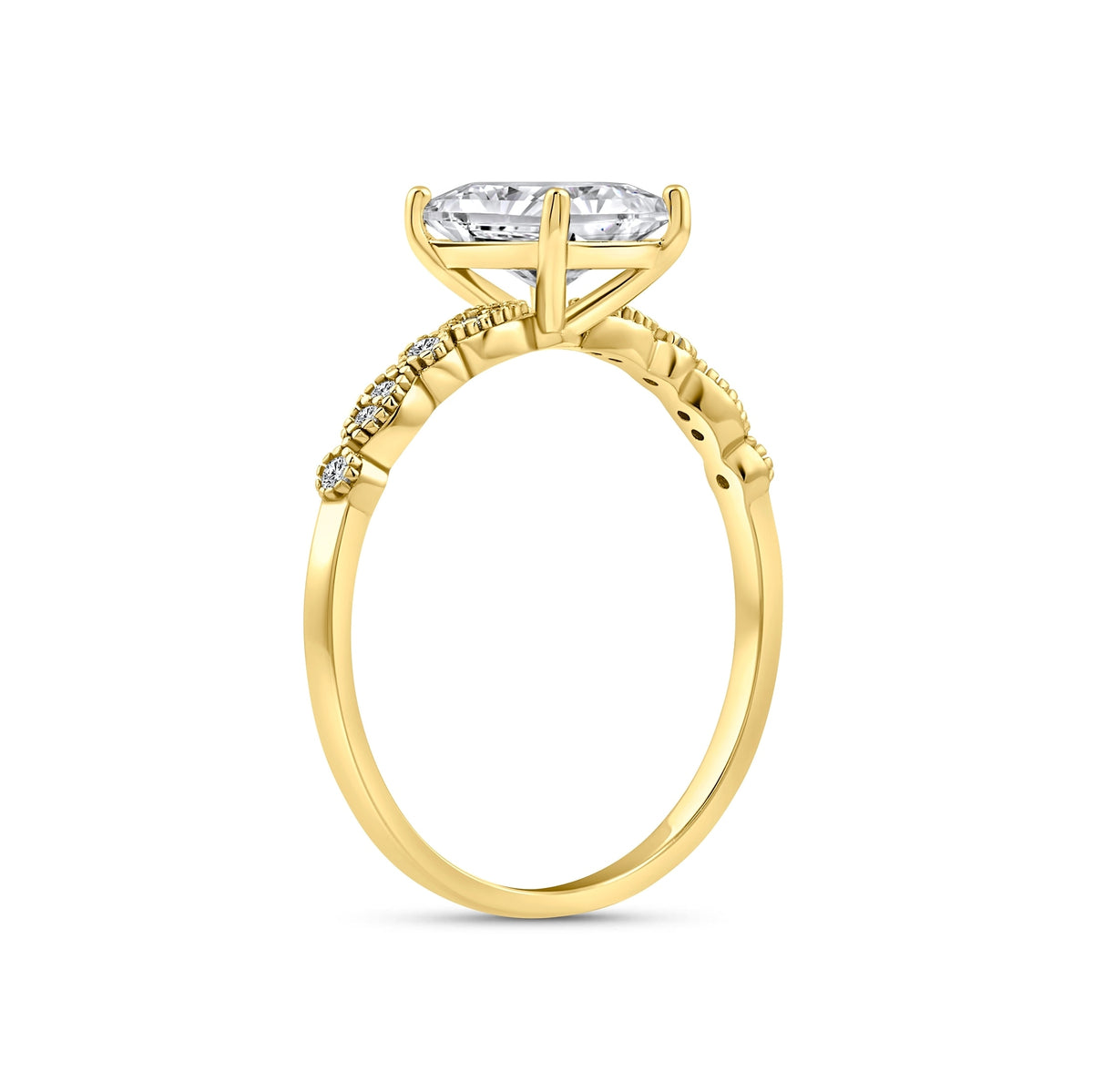 gold 1.5 carat radiant cut vintage-inspired engagement ring on a white background