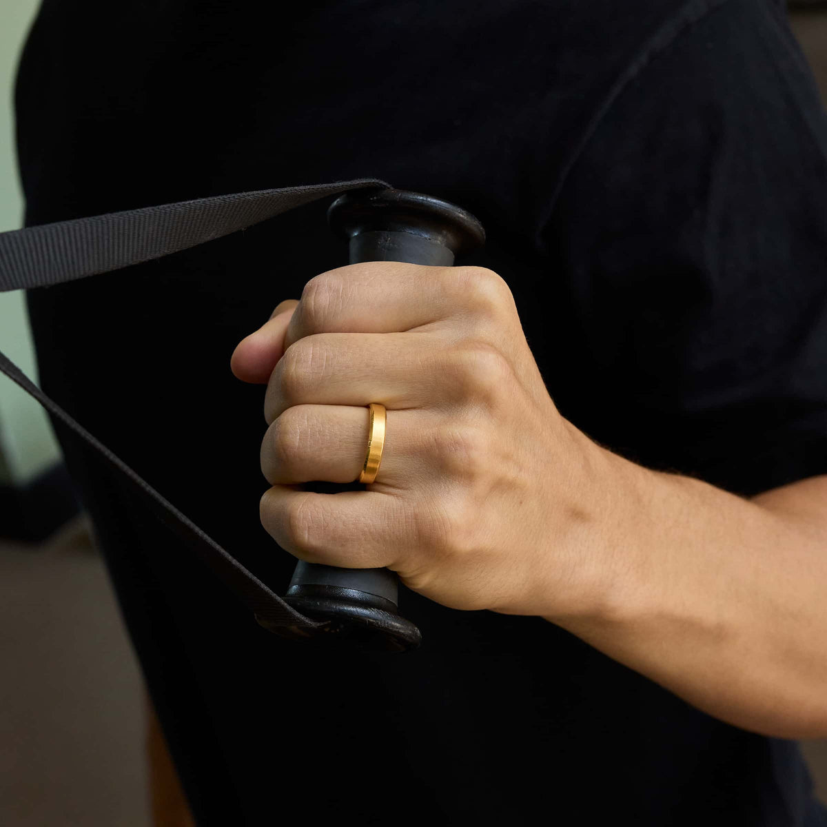 gold 5mm stainless steel band on model in gym