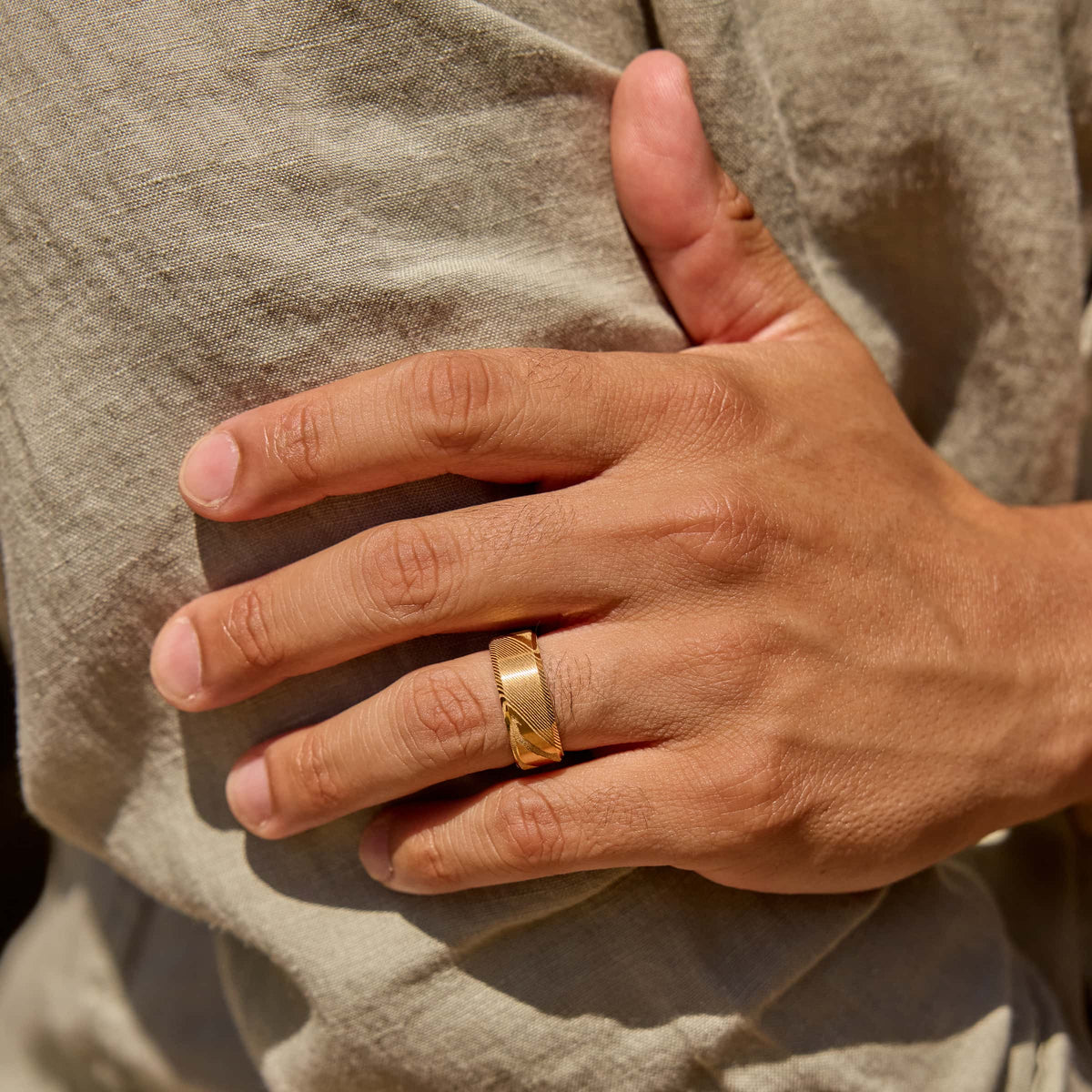 8mm gold damascus steel band on model
