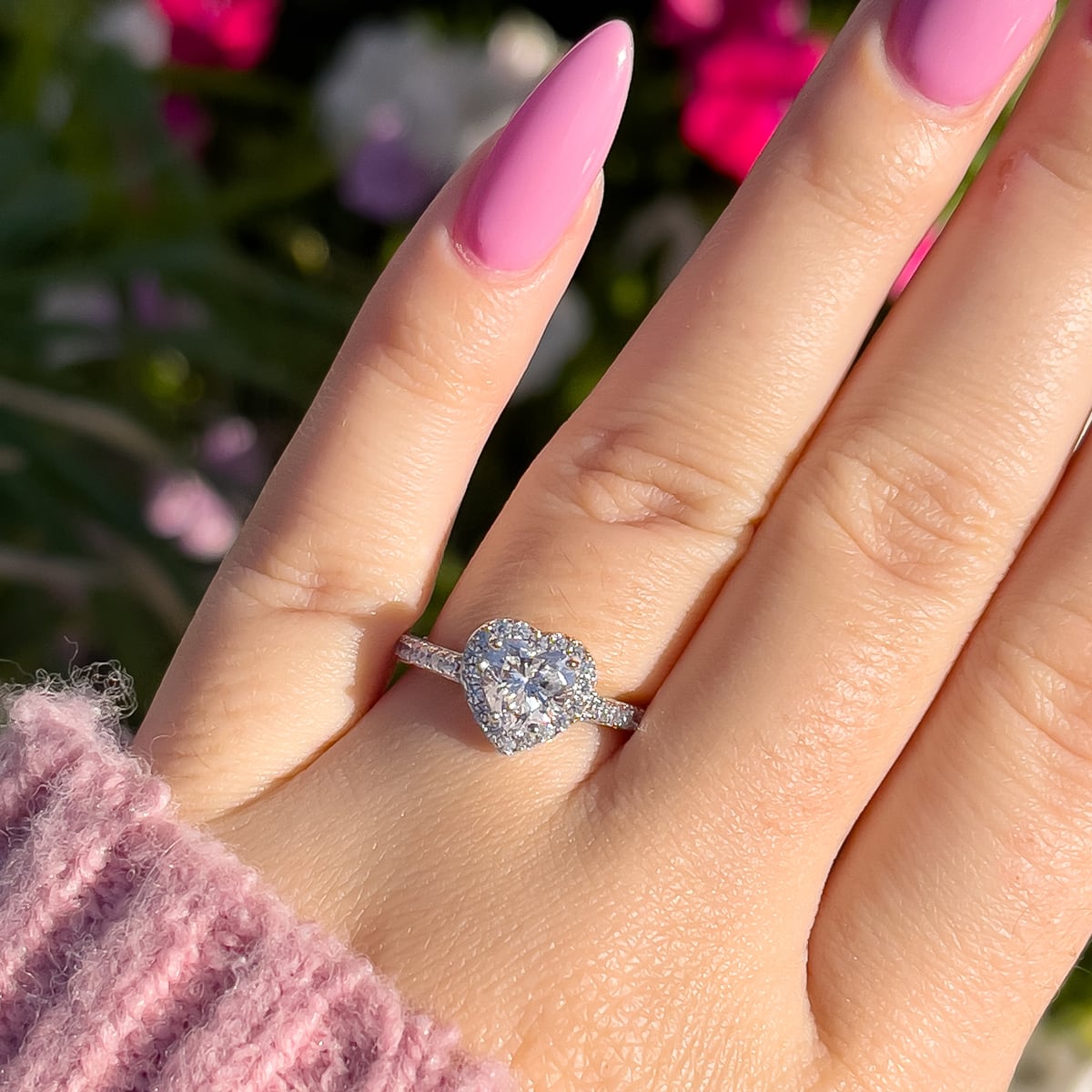 silver heart shaped engagement ring POV